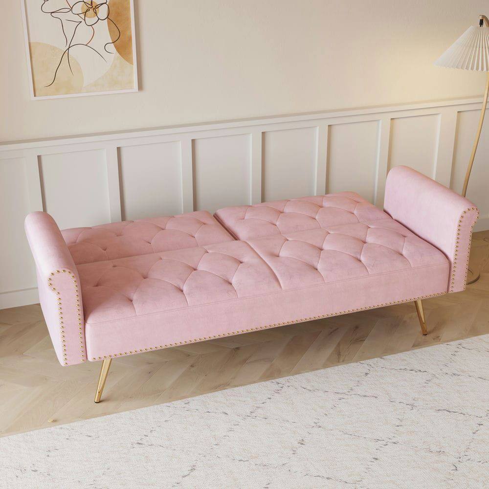Angle. Kadyn - 69.7" Velvet Sofa Bed with Nail Head Trim & Matching Throw Pillow - Pink.