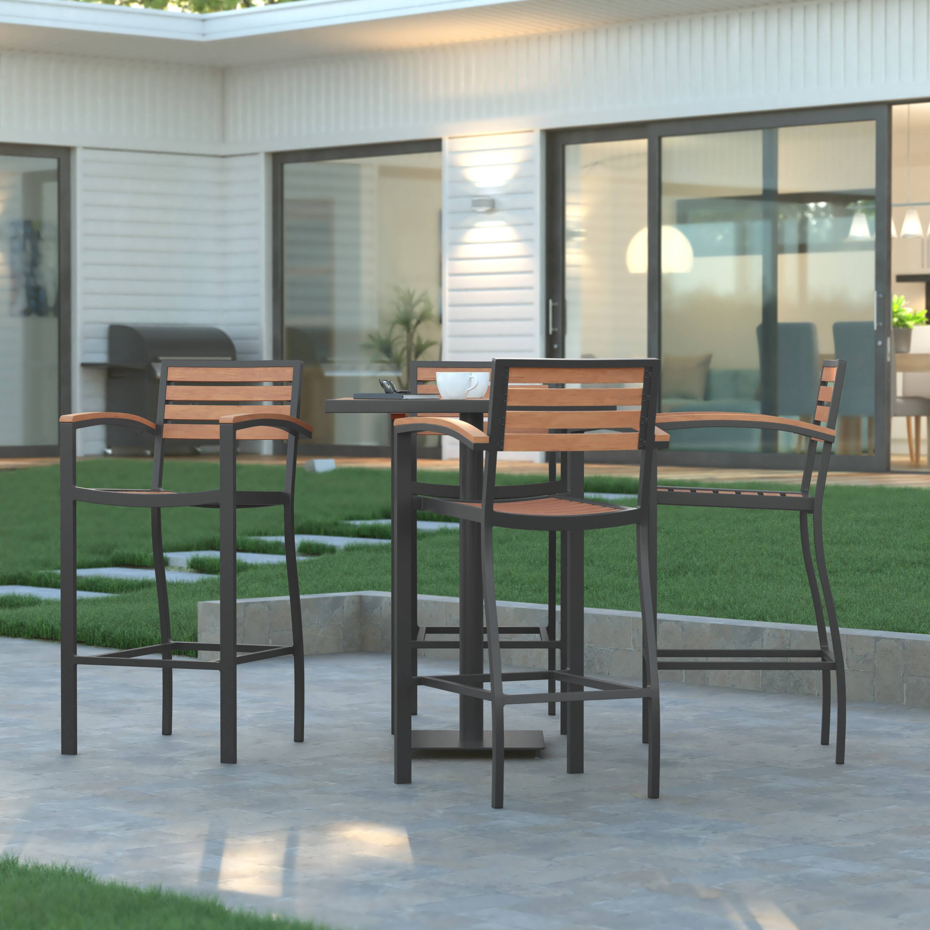 Alt View 4. Emma + Oliver - Livia All-Weather Bar Height Dining Stool with Armrests, Polyresin Slats and Aluminum Frame - Teak.