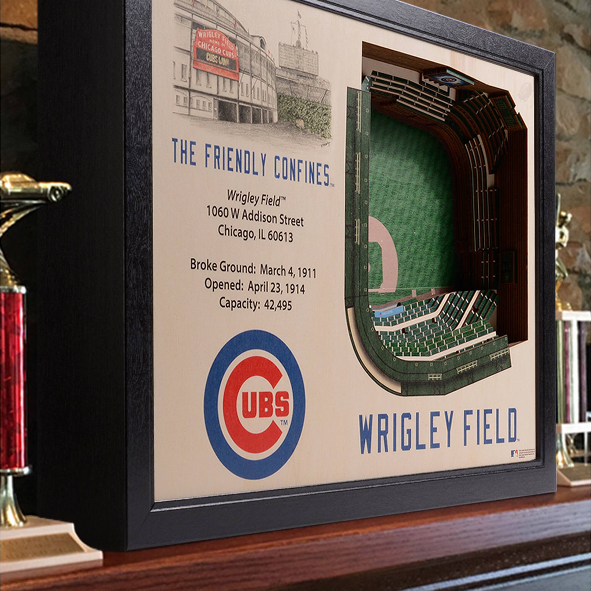 WRIGLEY FIELD  
CHICAGO CUBS  
CUBS FINES  

THE FRIENDLY CONFINES  

Wrigley Field  
1060 W Addison Street  
Chicago, IL 60613  

Broke Ground: March 4, 1911  
Opened: April 23, 1914  
Capacity: 42,495  

UBS  
WRIGLEY FIELD