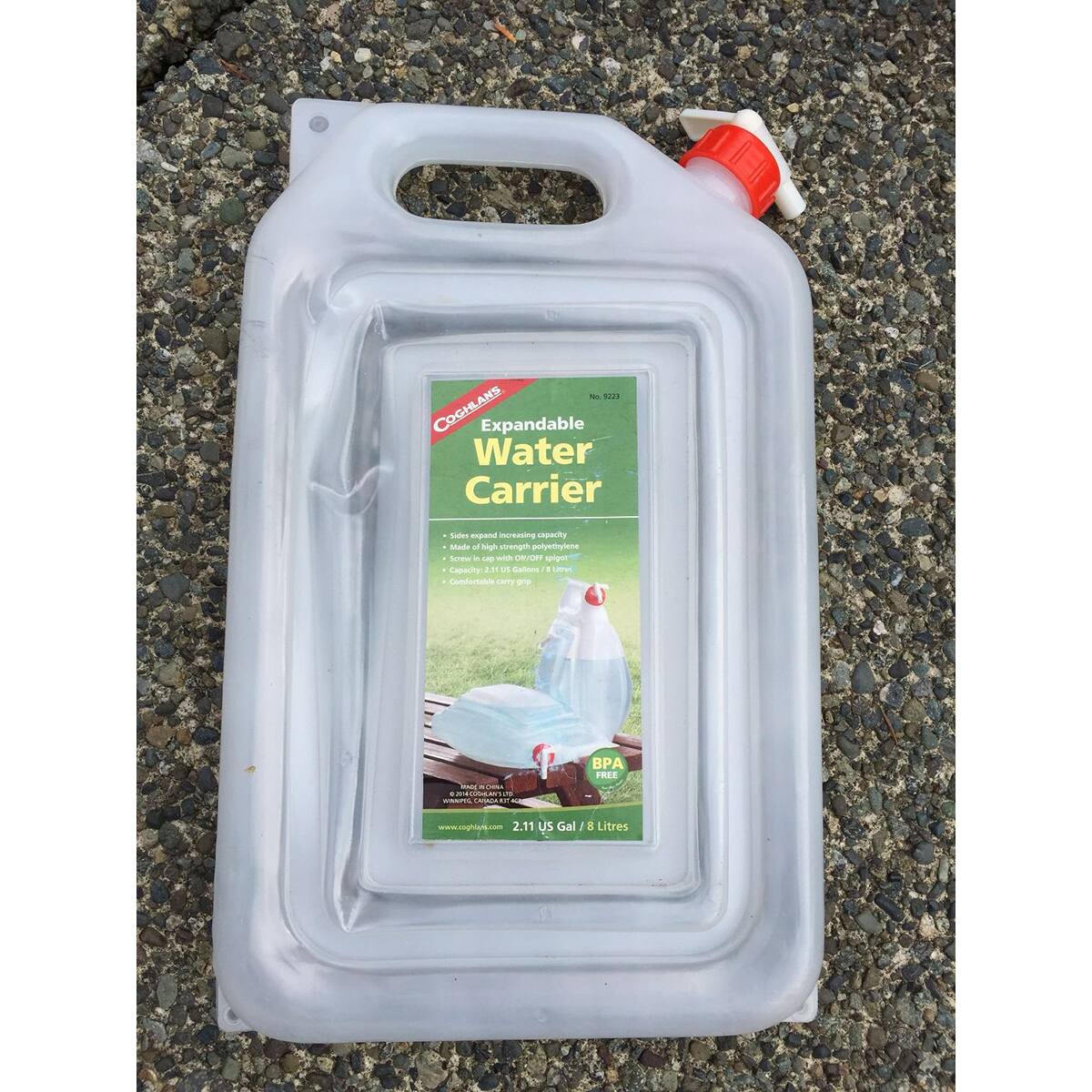 - NE COGHLANS Expandable Water Carrier LAs expand Buesin Agoedes Made a vsrempni polyethylene Sres - LP anh U uT - Capacity A m  CAtans  LUS Contontuatos Lmy - - -  PA FREE - ! .. www.raghooty.com 2.11 uS Gal  8 Litres