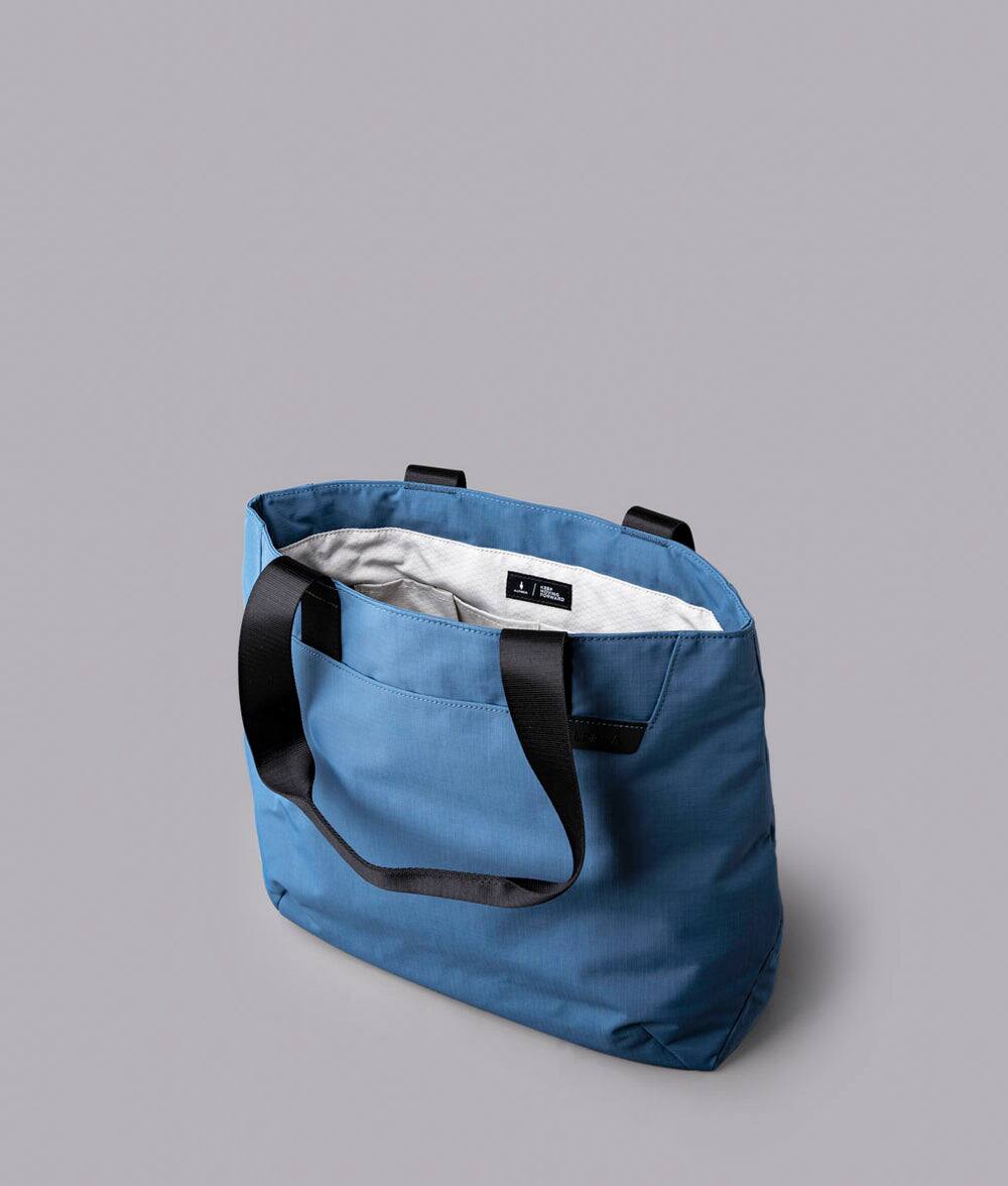 Alt View 2. ALPAKA - Elements Tote Bag 14.5L Weatherproof Foldable Travel Tote with Magnetic Closure - Blue/G Axoflux 210D.