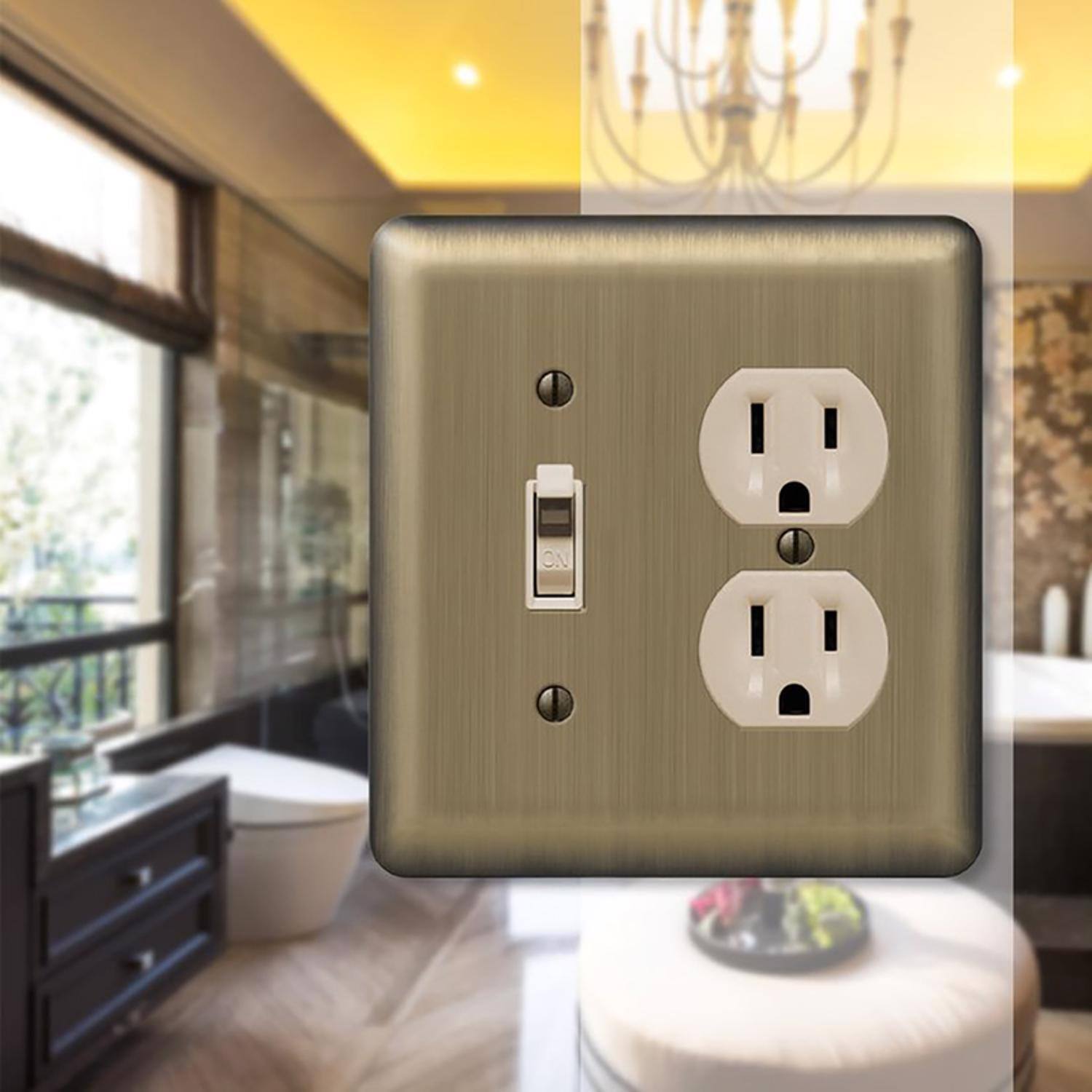 Left. AMERELLE - Amerelle Devon Brushed Brass 2 gang Stamped Steel Duplex/Toggle Wall Plate 1 pk - Brass.