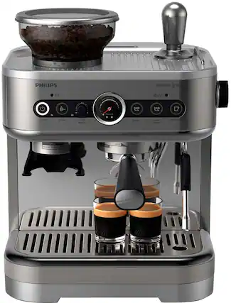 The image features a silver coffee maker with a grinder, which is a Philips Barista Brew. The coffee maker has a range of options for optimal brewing, including a 1u to 2u pressure on the grinder and a manual grind lock. The coffee maker is designed to produce the perfect espresso, whether it's a single espresso or an Americano. The grinder is an essential component of the coffee maker, ensuring that the coffee beans are ground to the desired consistency for optimal brewing.