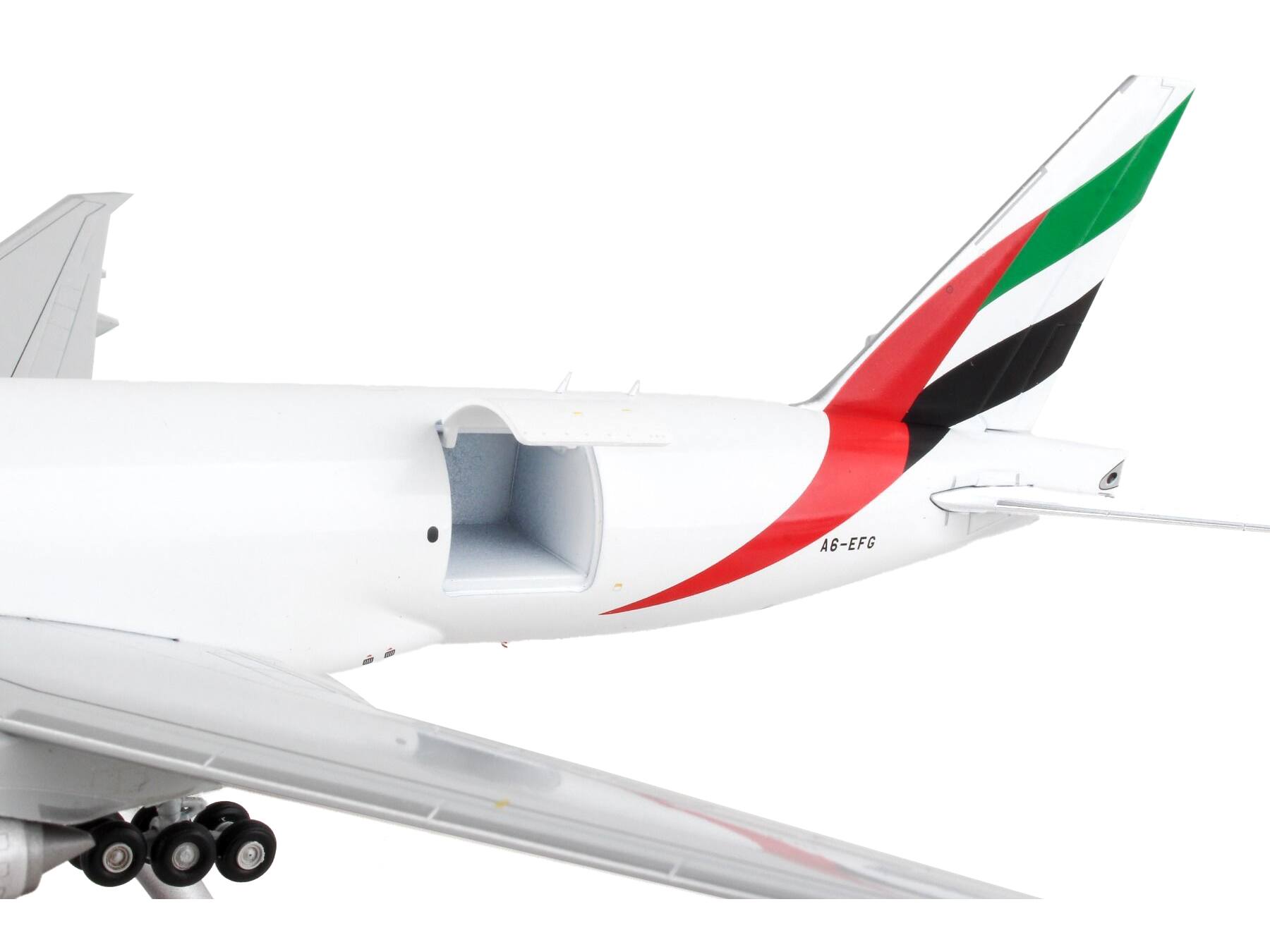 Left. GeminiJets - Boeing 777F Commercial Aircraft Emirates SkyCargo White with Striped Tail Gemini 200 Interactive 1/200 - White with Striped Tail.