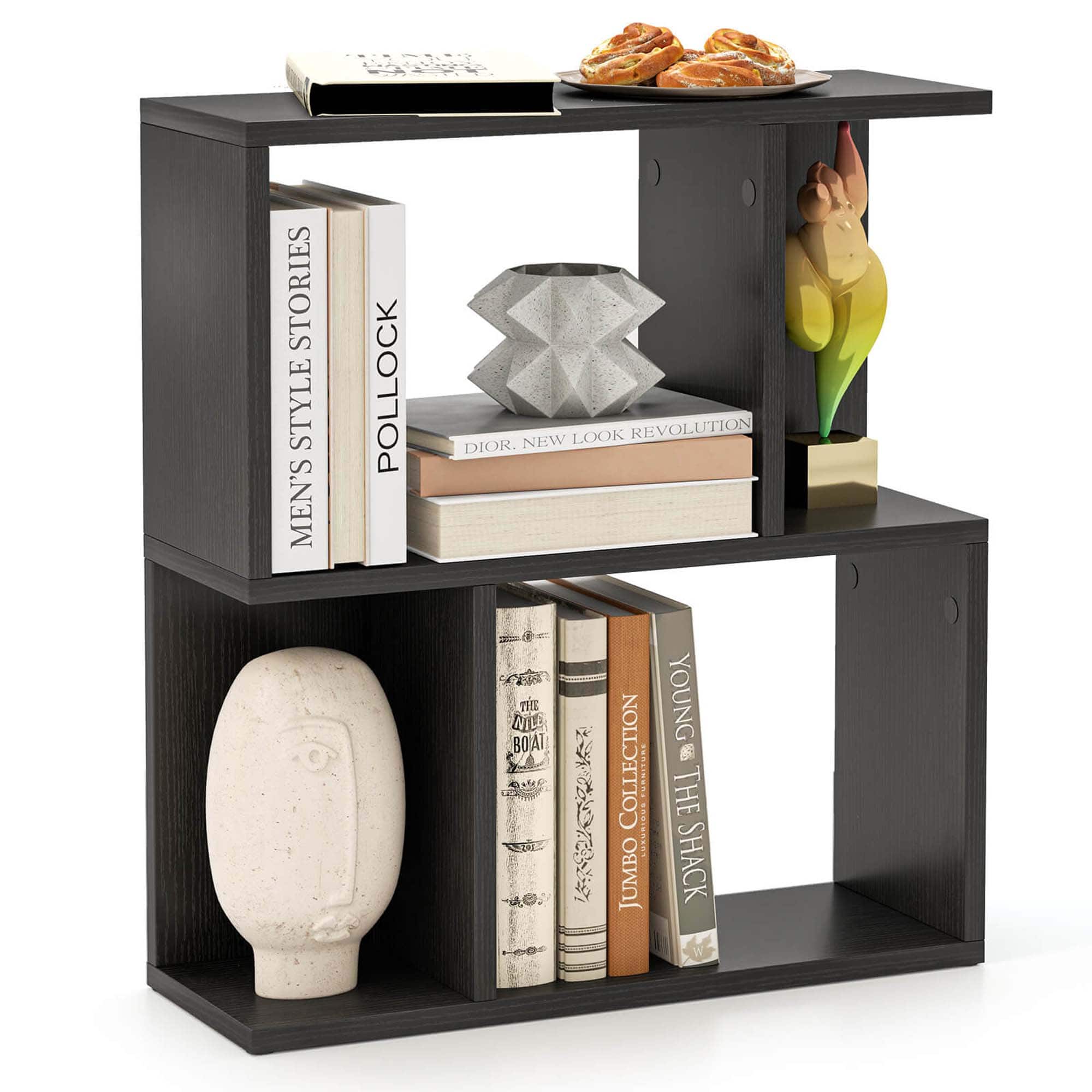 The image features a black bookshelf with various items on it. There are several books of different sizes, including a large book on the bottom shelf. Additionally, there is a vase and a small statue on the shelf. The arrangement of the items creates an aesthetically pleasing display.