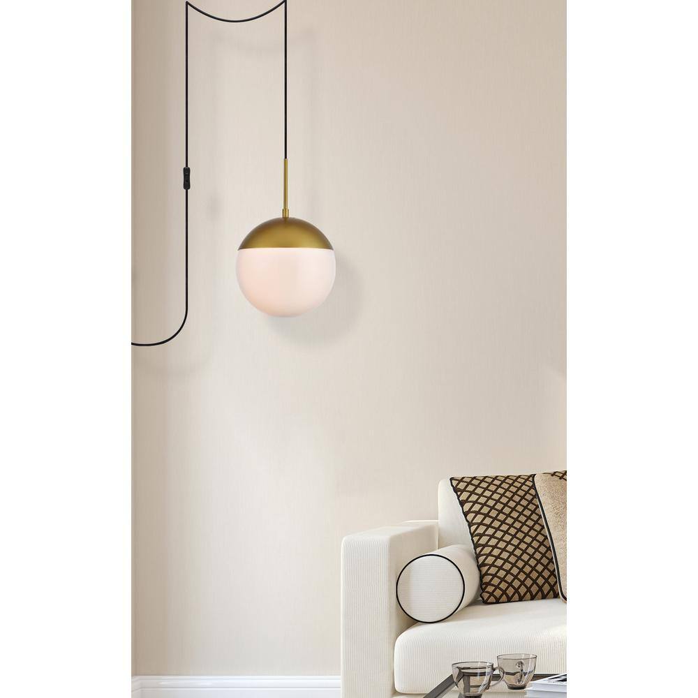 Left. Living District - Eclipse 1 Light Brass plug in pendant With Frosted White Glass - Brass And Frosted White.