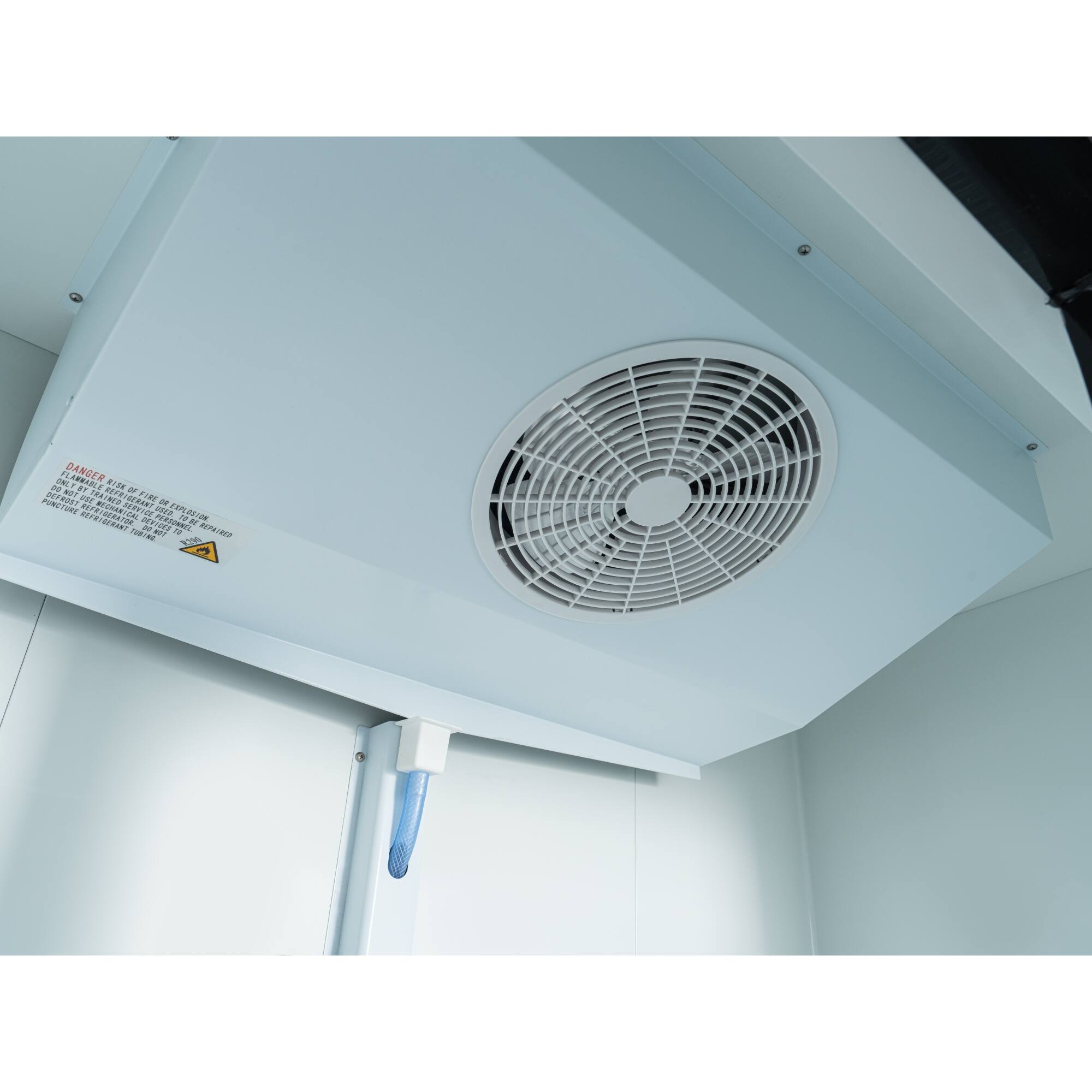 The text on the image reads "Danger Labbable - Defrost net.psaul be a PEEIEY NAE MARN N M REPAIRET d." This text is likely a warning or instruction related to the defrosting process of the freezer. The message suggests that the defrosting process should be carried out carefully, and it may involve the use of a defrost net or other specialized equipment to ensure safety and prevent damage to the freezer.