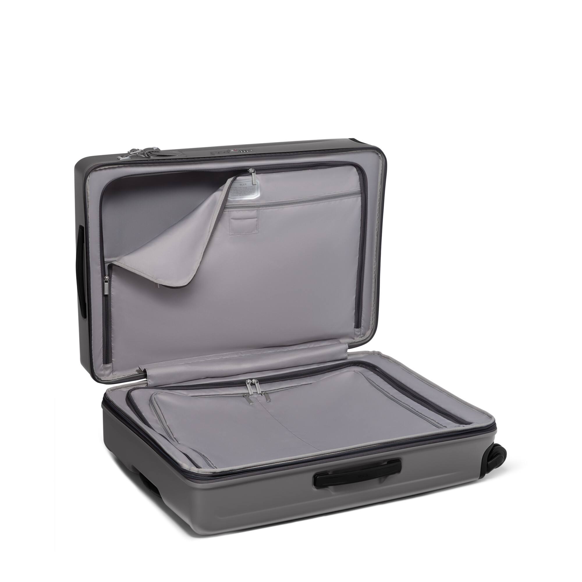 Angle. TUMI - Ventra Large Expandable Checked Spinner Suitcase - Castle Rock Texture.