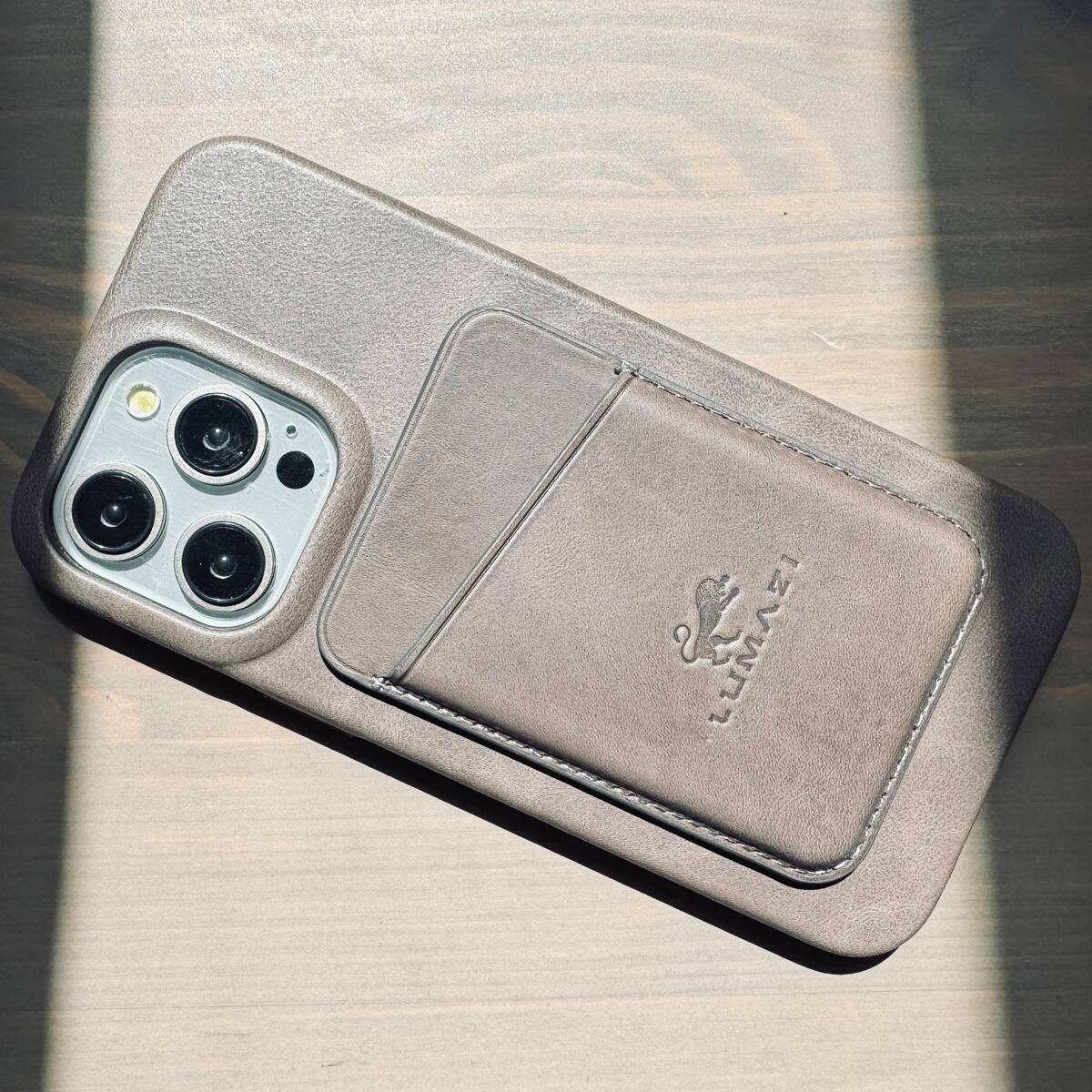 Left. LUMAZI - Full Grain Leather MagSafe Wallet - Taupe.