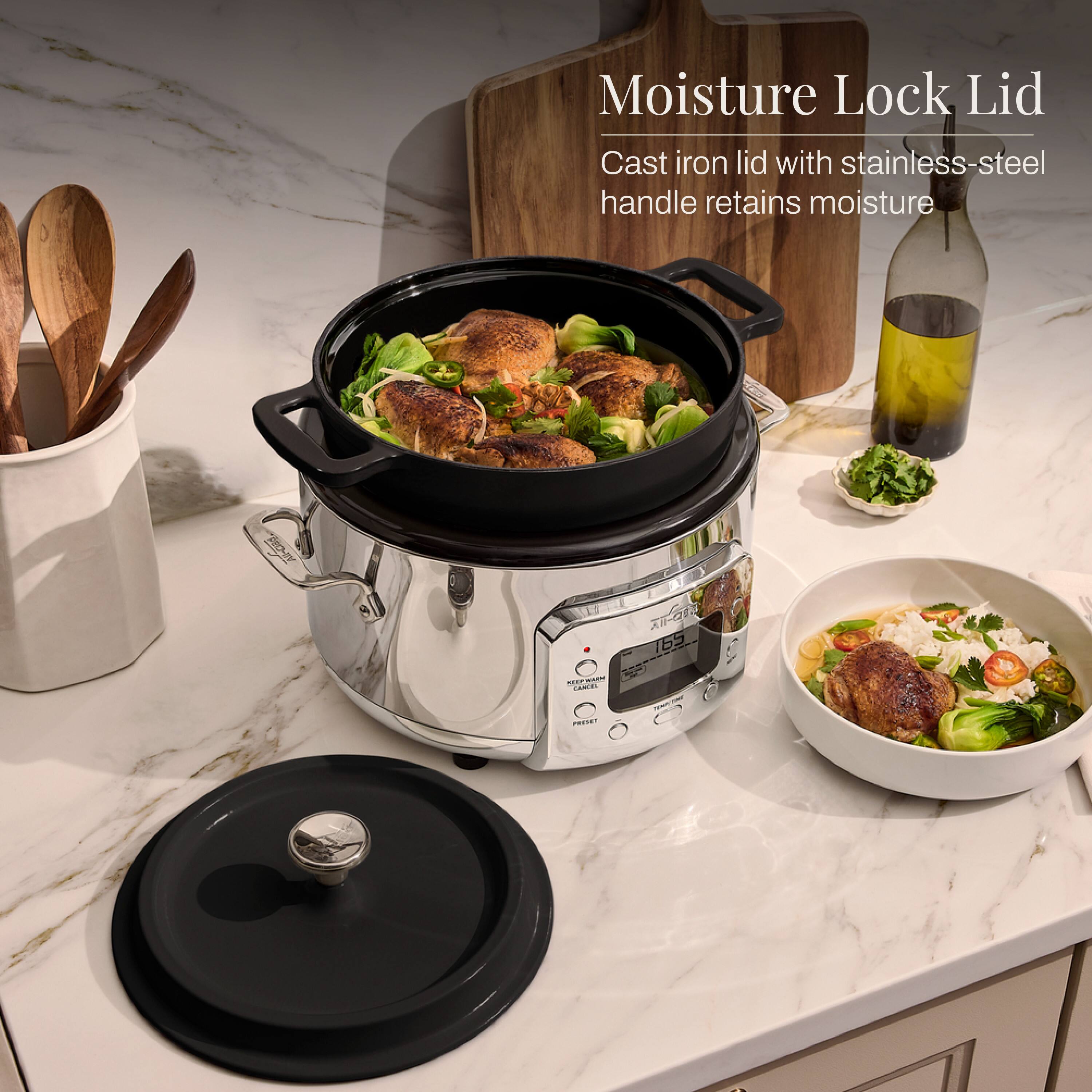 Moisture Lock Lid  
Cast iron lid with stainless-steel handle retains moisture  

All-Cisa  
KEEPWARM CANCEL  
165  
PRESET