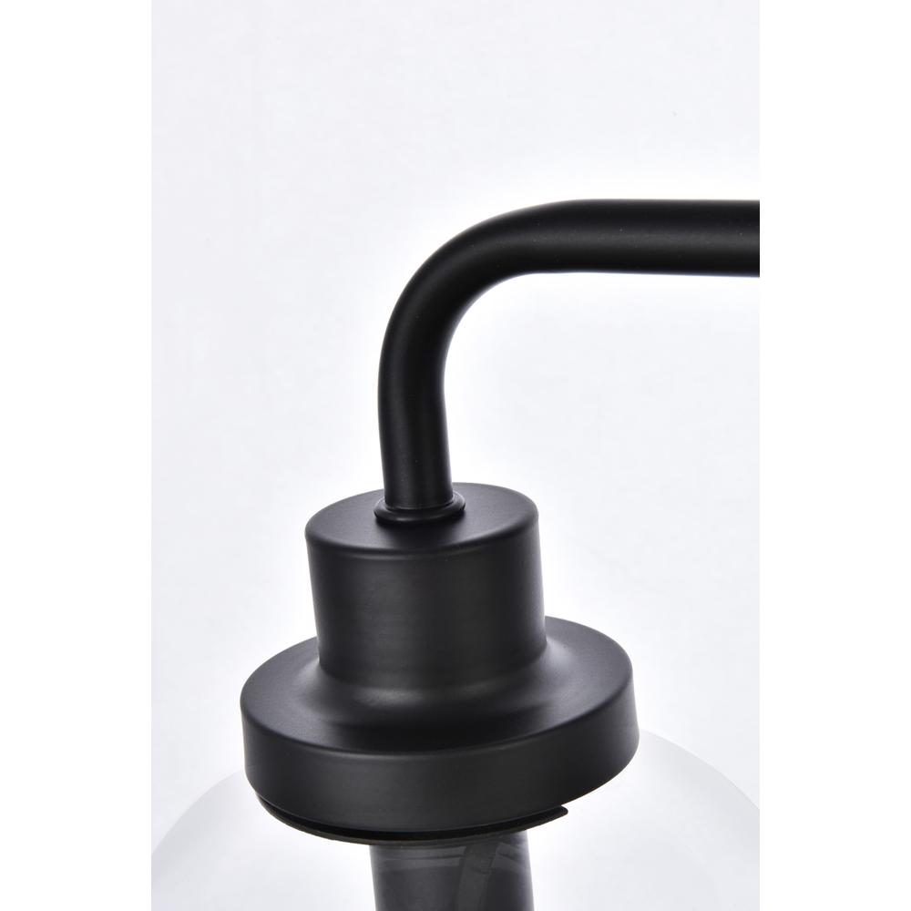 Left. Living District - Hanson 4 lights bath sconce in black with clear shade - Black And Clear Shade.