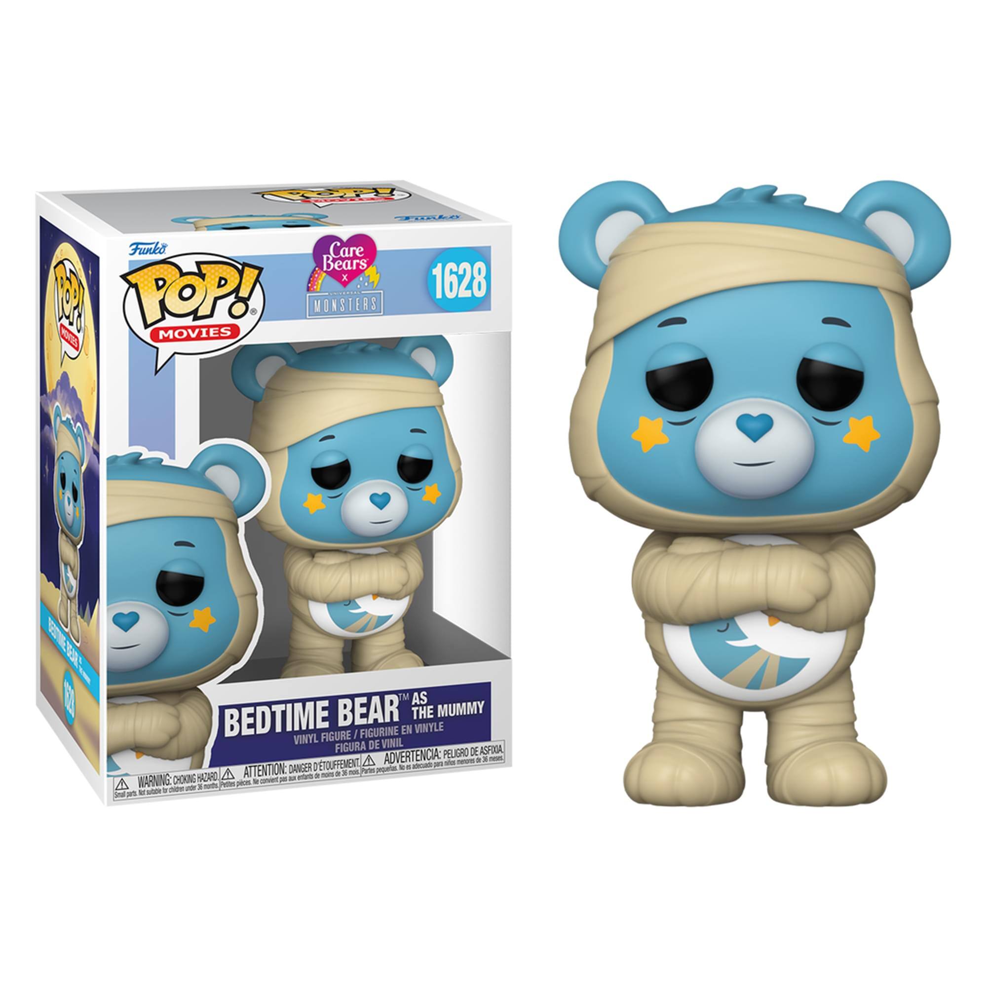 Sure, here is the corrected and grouped text from the image:
---
**Front of the Box:**
- **Top Left:** Funko POP! MOVIES
- **Top Right:** Care Bears MONSTERS 1628
- **Center:** BEDTIME BEAR AS THE MUMMY
- **Bottom:** VINYL FIGURE / FIGURINE EN VINYLE / FIGURA DE VINIL / FIGURA DE VINIL
**Warnings:**
- **Bottom Left:** WARNING: CHOKING HAZARD - Small parts. Not for children under 3 years.
- **Bottom Center:** ATTENTION: DANGER DE SOUFFOCATION - Petits pièces. Ne convient pas aux enfants de moins de 3 ans.
- **Bottom Right:** ADVERTENCIA: PEQUEÑOS PIEZAS. NO ES APTO PARA NIÑOS MENORES DE 3 AÑOS.
**Additional Text:**
- **Bottom Center:** COLLECTIBLE VINYL FIGURE
- **Bottom Right:** COLLECTIBLE VINYL FIGURE
---