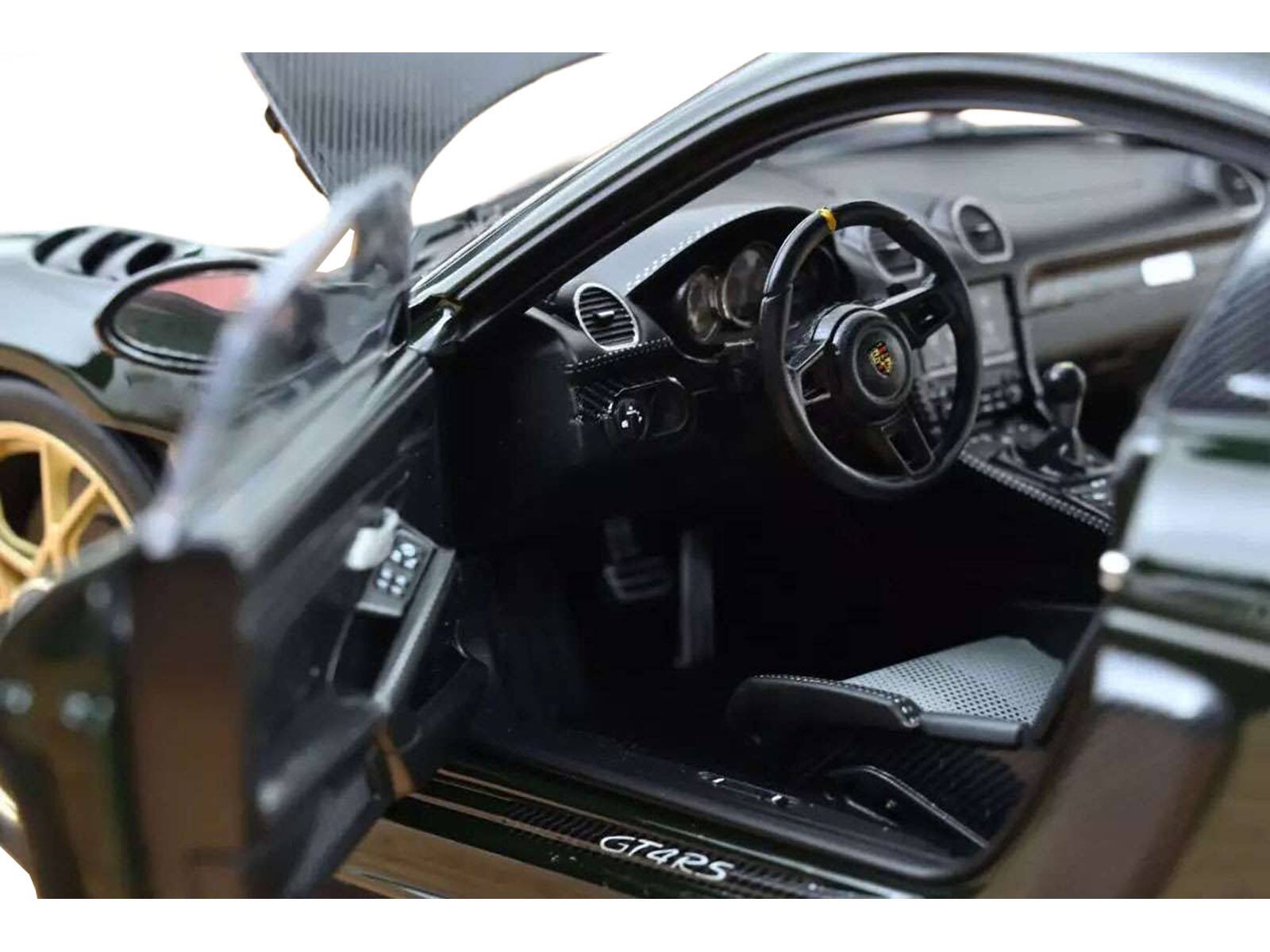 Back. Norev - 2023 Porsche Cayman GT4 RS Weissach Pack Brewster Green with Carbon Hood 1/18 Diecast Model Car by Norev - Green.