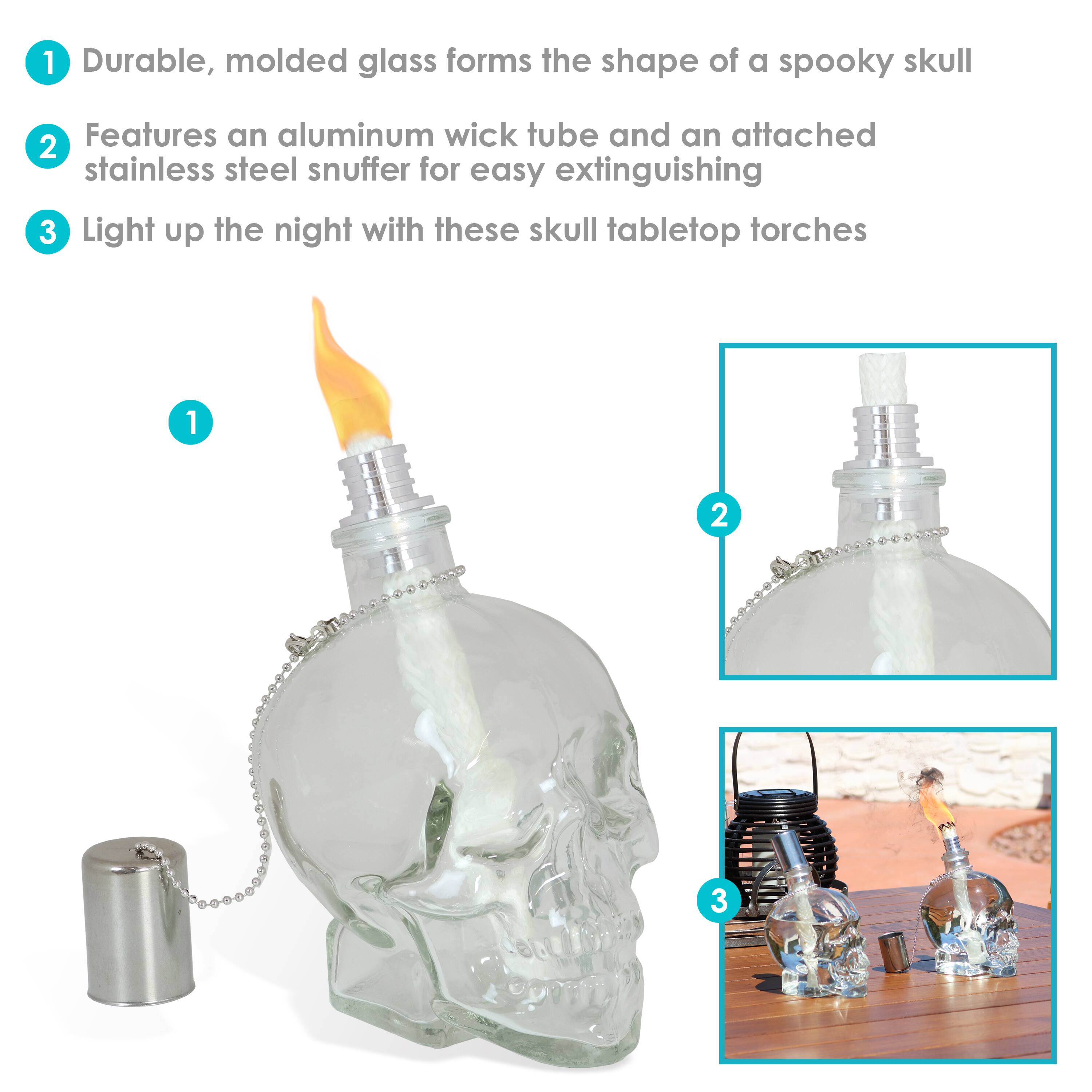 1. Durable, molded glass forms the shape of a spooky skull.
2. Features an aluminum wick tube and an attached stainless steel snuffer for easy extinguishing.
3. Light up the night with these skull tabletop torches.