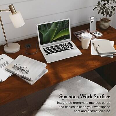 Spacious Work Surface  
Integrated grommets manage cords and cables to keep your workspace neat and distraction-free