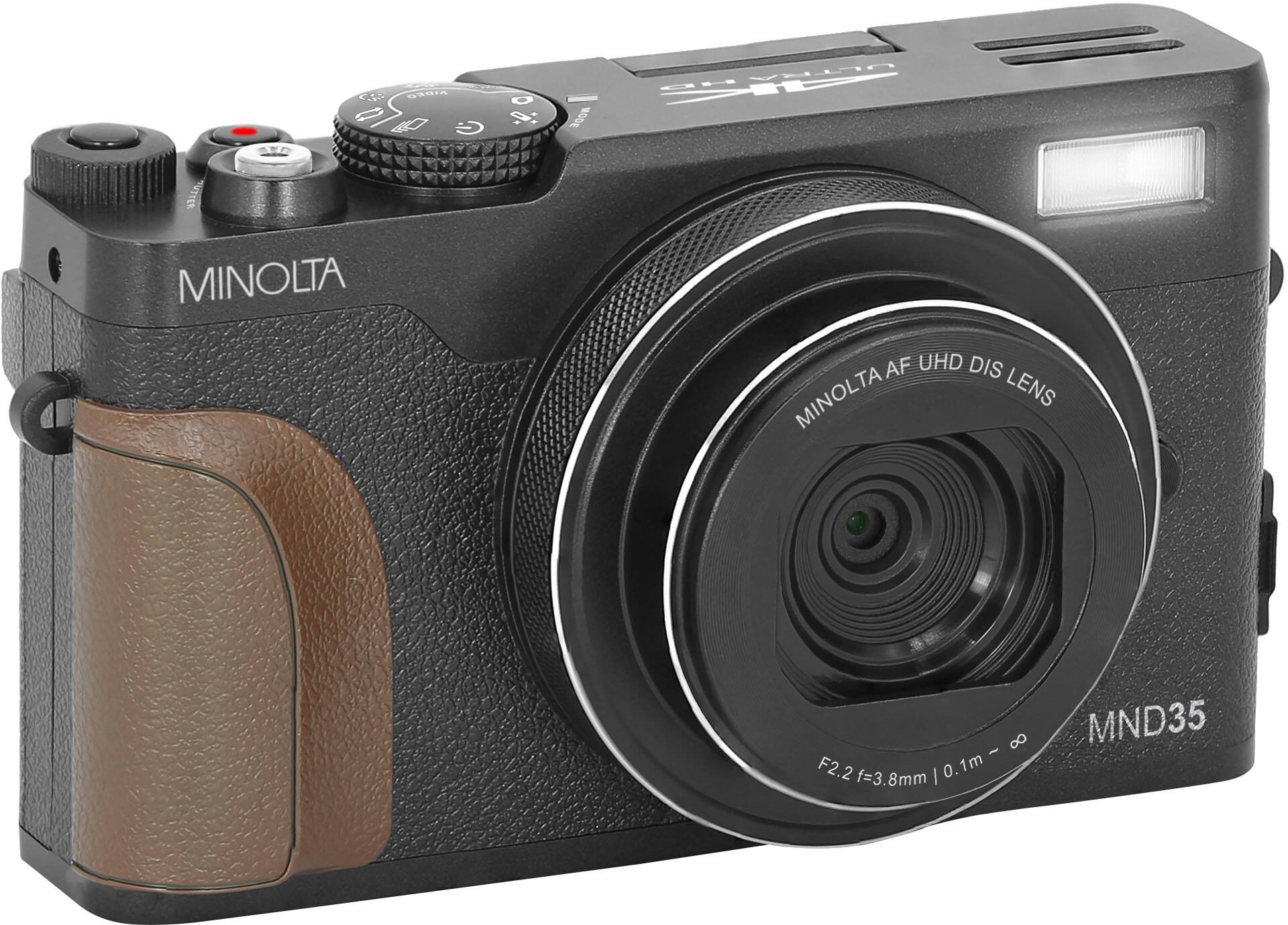 The text on the image reads: "MINOLTA AF UHD DIS MINOLTA LENS 8 - F2.2 f=3.8mm | 0.1m MND35."