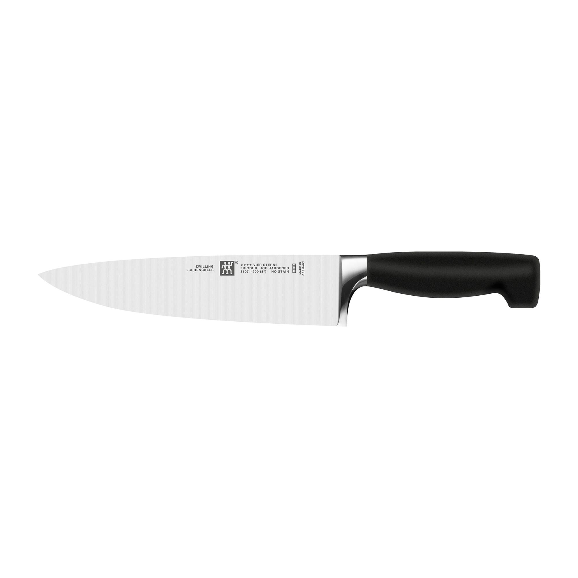Zwilling  
J.A. Henckels  
1517-600  
NO STAINLESS  
...VER STEEL  
...E d...N  
Fd ... AMMLS m Fddas  
... 4 : CASDENCS