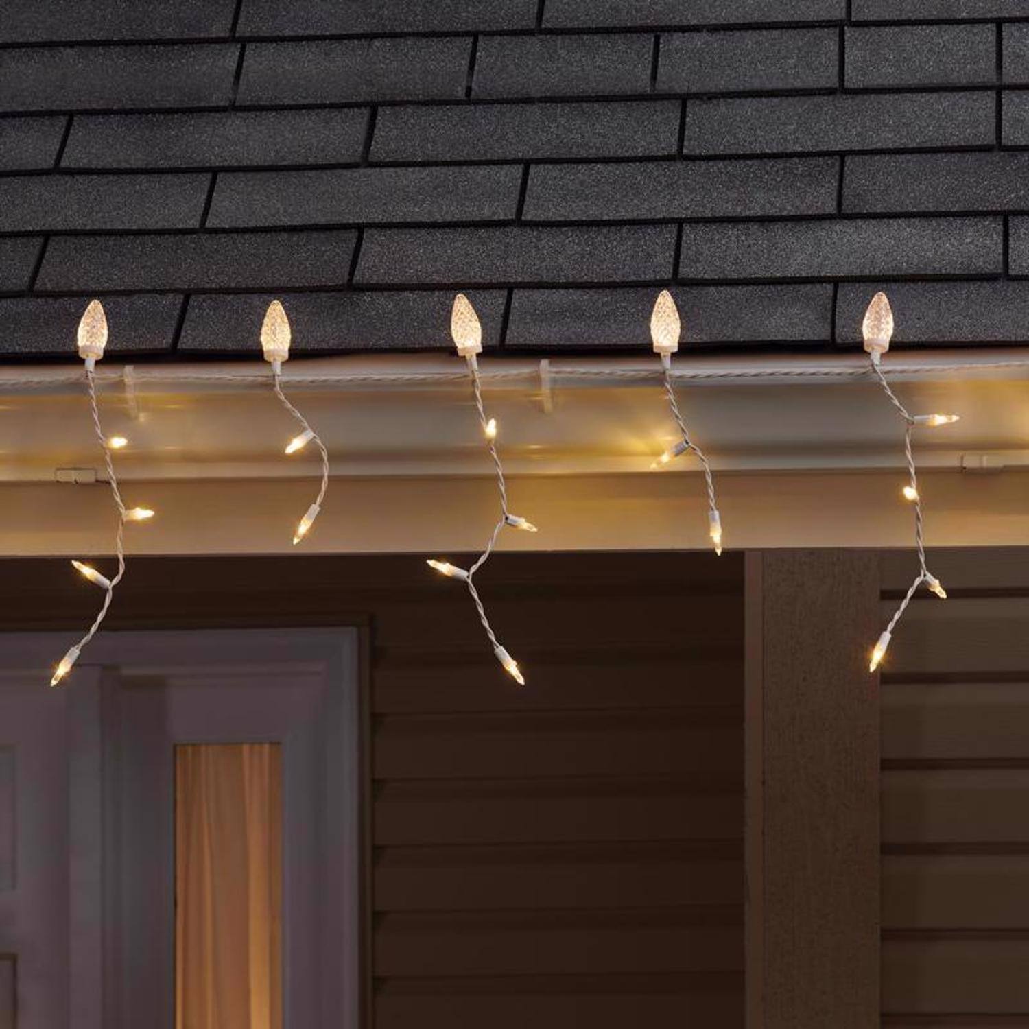 Left. Celebrations - Celebrations Blue LED C9 Warm White 70 ct Icicle Christmas Lights 9 ft..