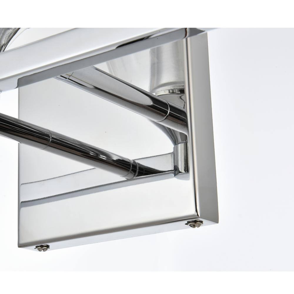 Left. Living District - Foster 4 light Chrome and Clear Bath Sconce - Chrome And Clear.