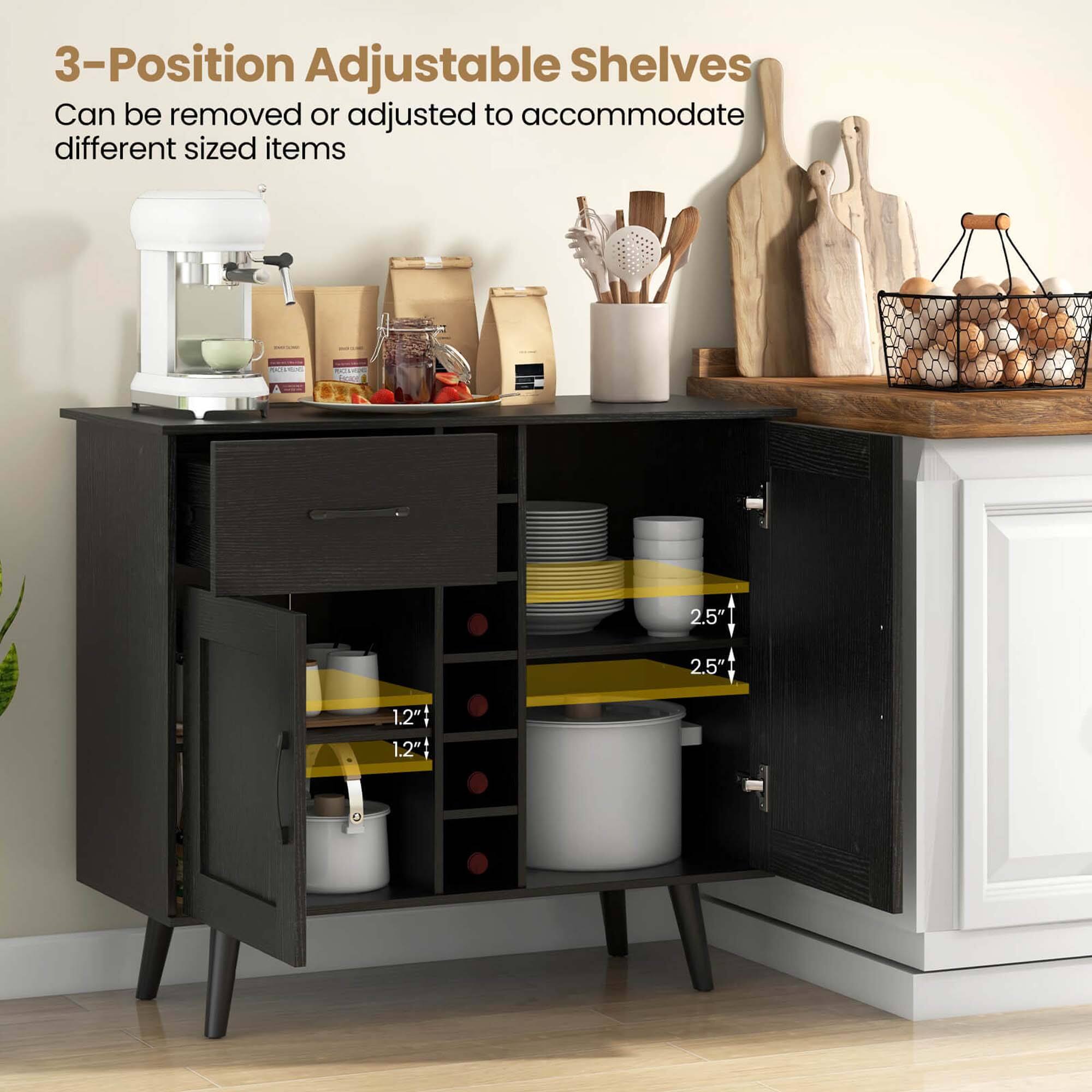 The image features a kitchen with a black cabinet that has three adjustable shelves. These shelves can be removed or adjusted to accommodate different sized items, making them versatile and functional for various kitchen needs. The cabinet is filled with various kitchen items, such as bowls, cups, and bottles, showcasing the practicality of the adjustable shelves.