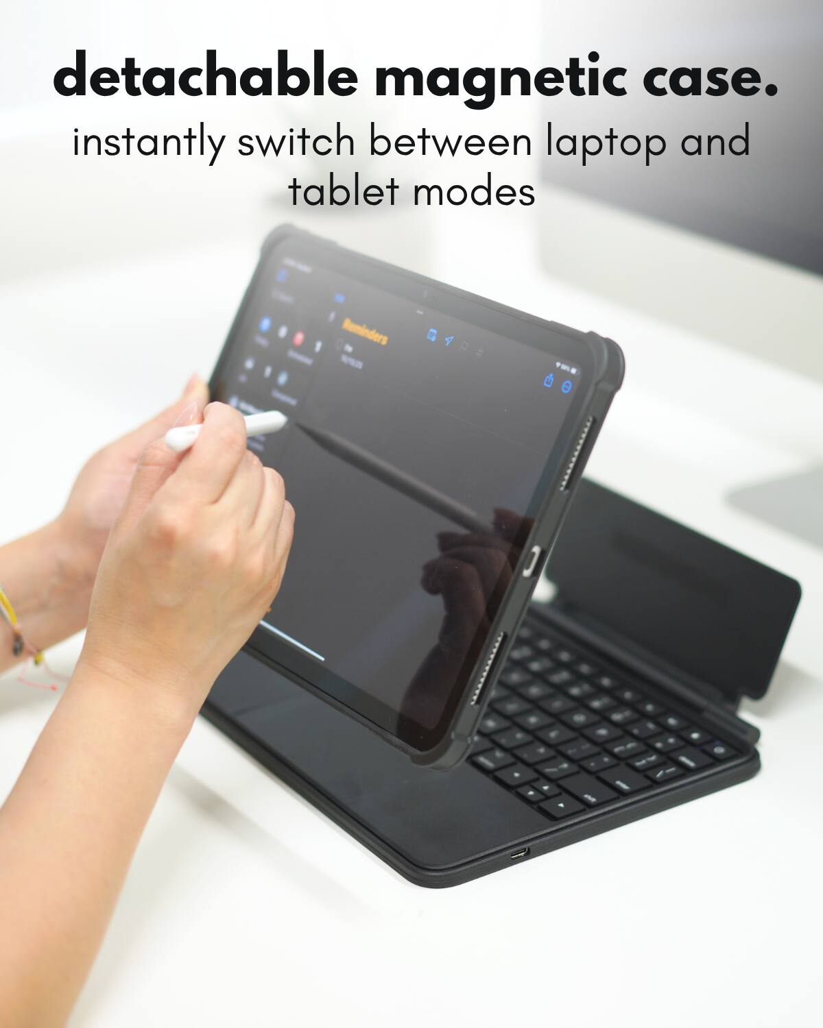 detachable magnetic case.  
instantly switch between laptop and tablet modes