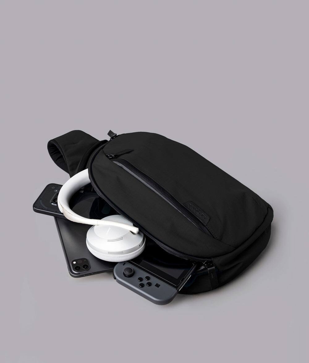 Alt View 4. ALPAKA - Metro Crossbody Right Shoulder Sling Bag Men,Sling Backpack - Fits 11" Tablet - Single Shoulder - Black Axoflux 210D.