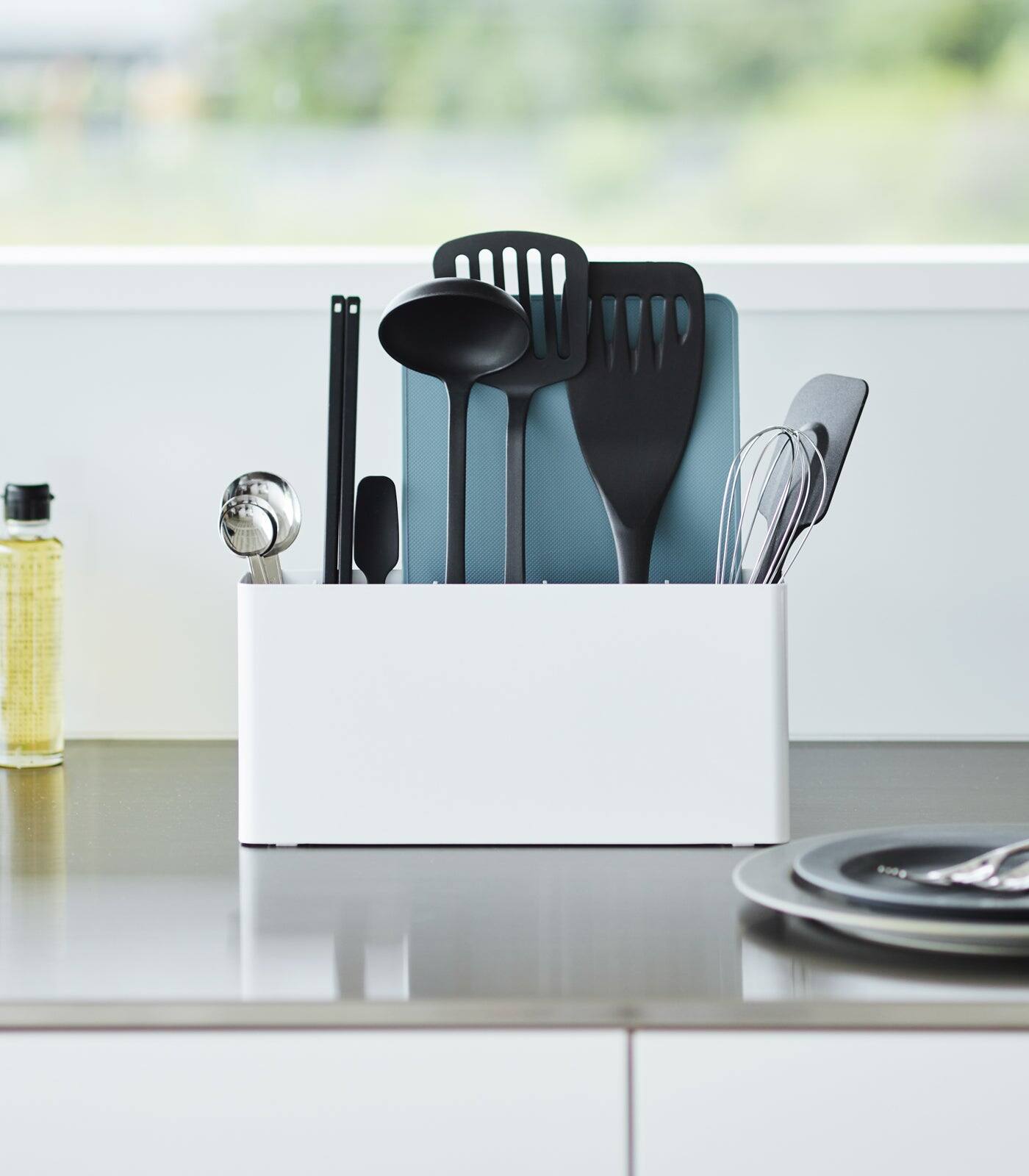 Back. Yamazaki Home - Utensil & Thin Cutting Board Holder - Steel - Black.