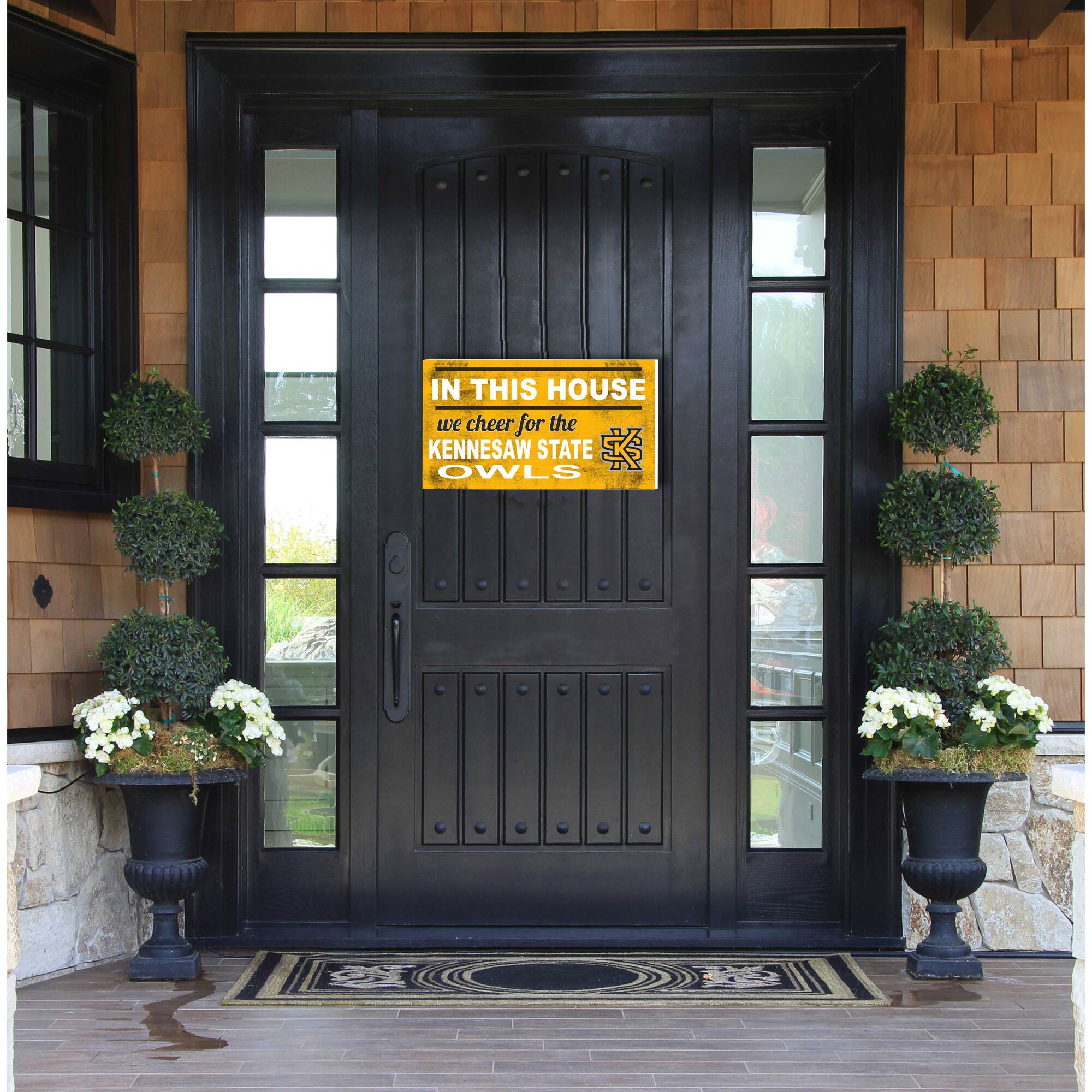 IN THIS HOUSE  
we cheer for the  
KENNESAW STATE  
OWLS