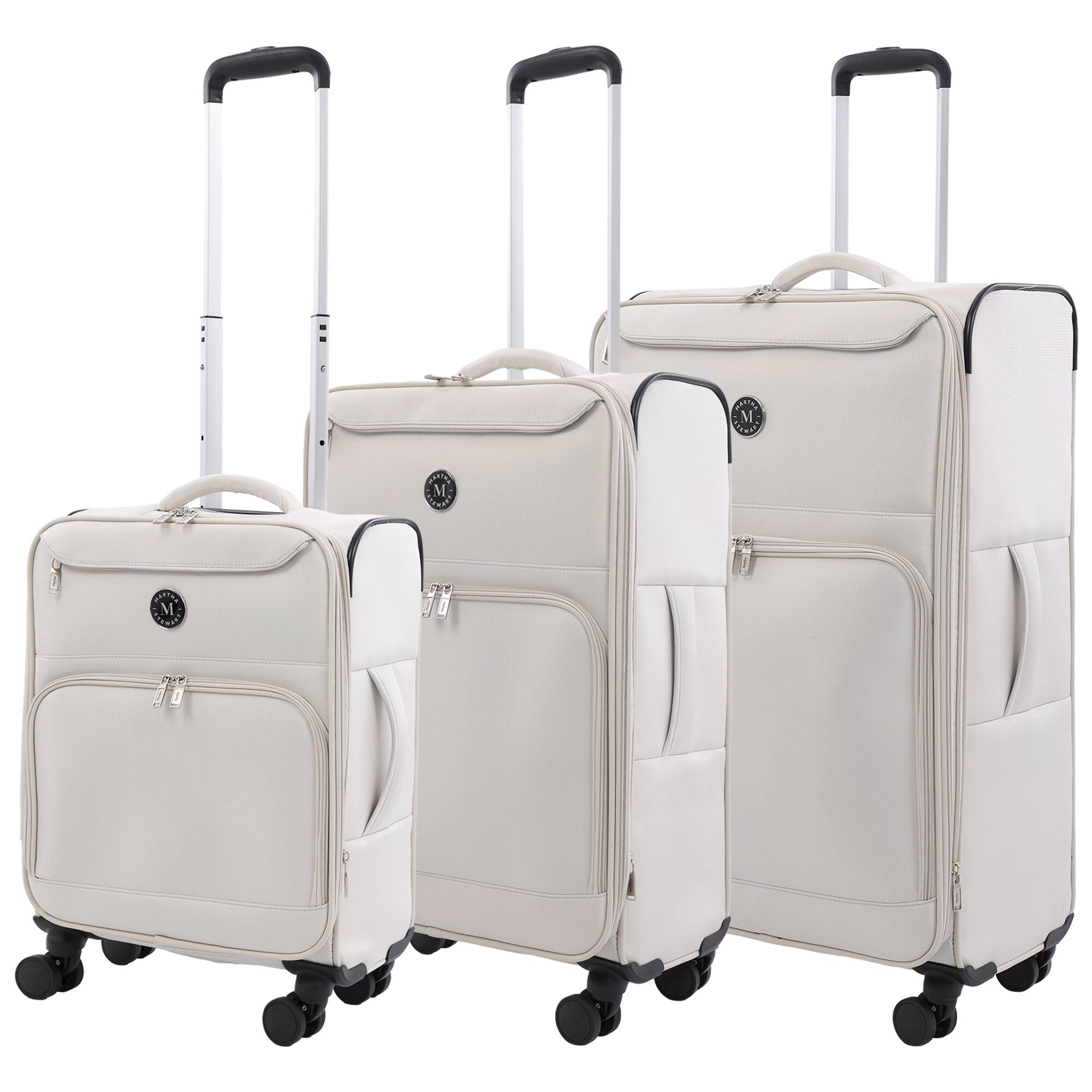 Angle. Martha Stewart - 3-Piece Softside Luggage Set – 22" Carry-On, 27" Medium, 31" Large – 8 Spinner Wheels, Expandable Softshell - LIGHT GREY.