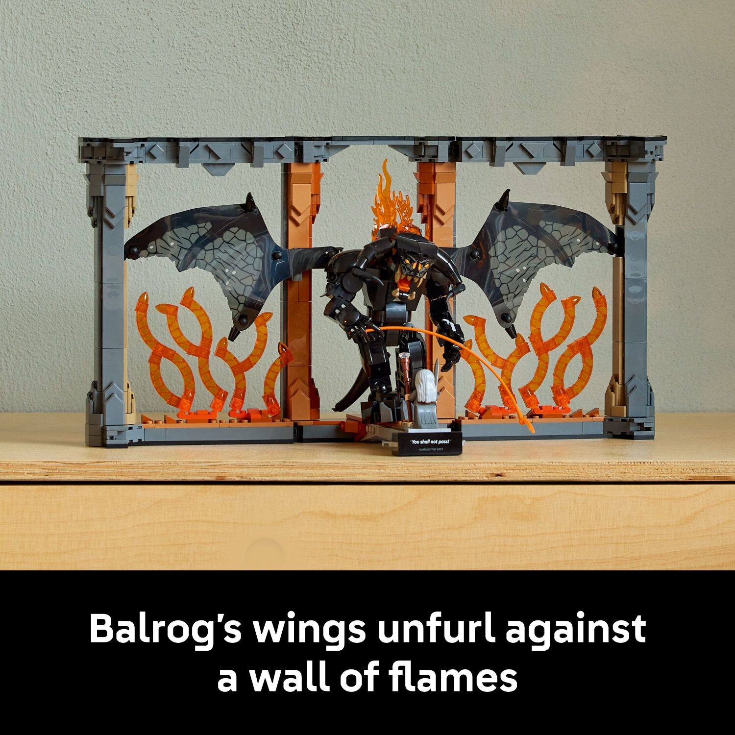 89 18 - - - - Balrog's wings unfurl against a wall of flames.