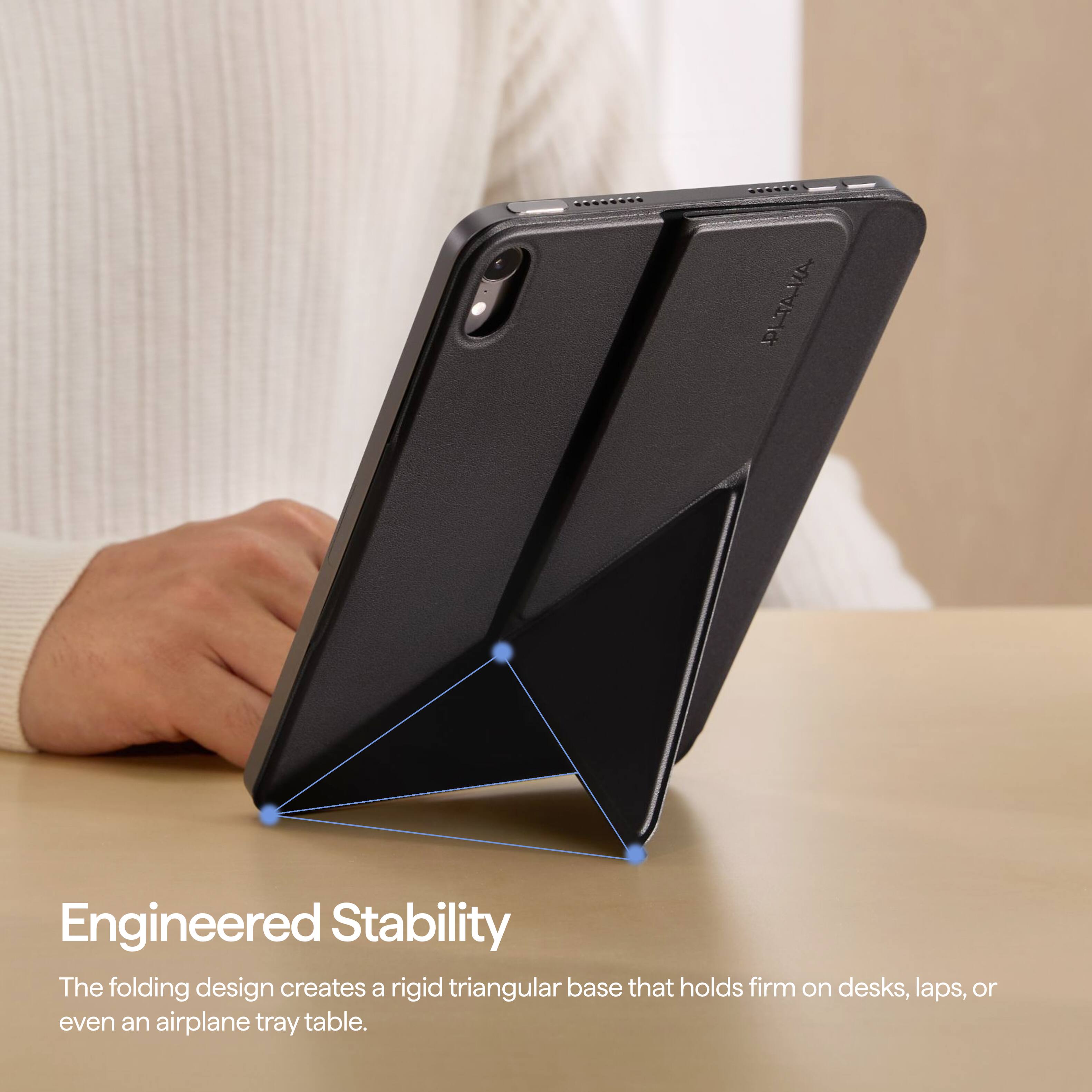 PITAKA

Engineered Stability
The folding design creates a rigid triangular base that holds firm on desks, laps, or even an airplane tray table.