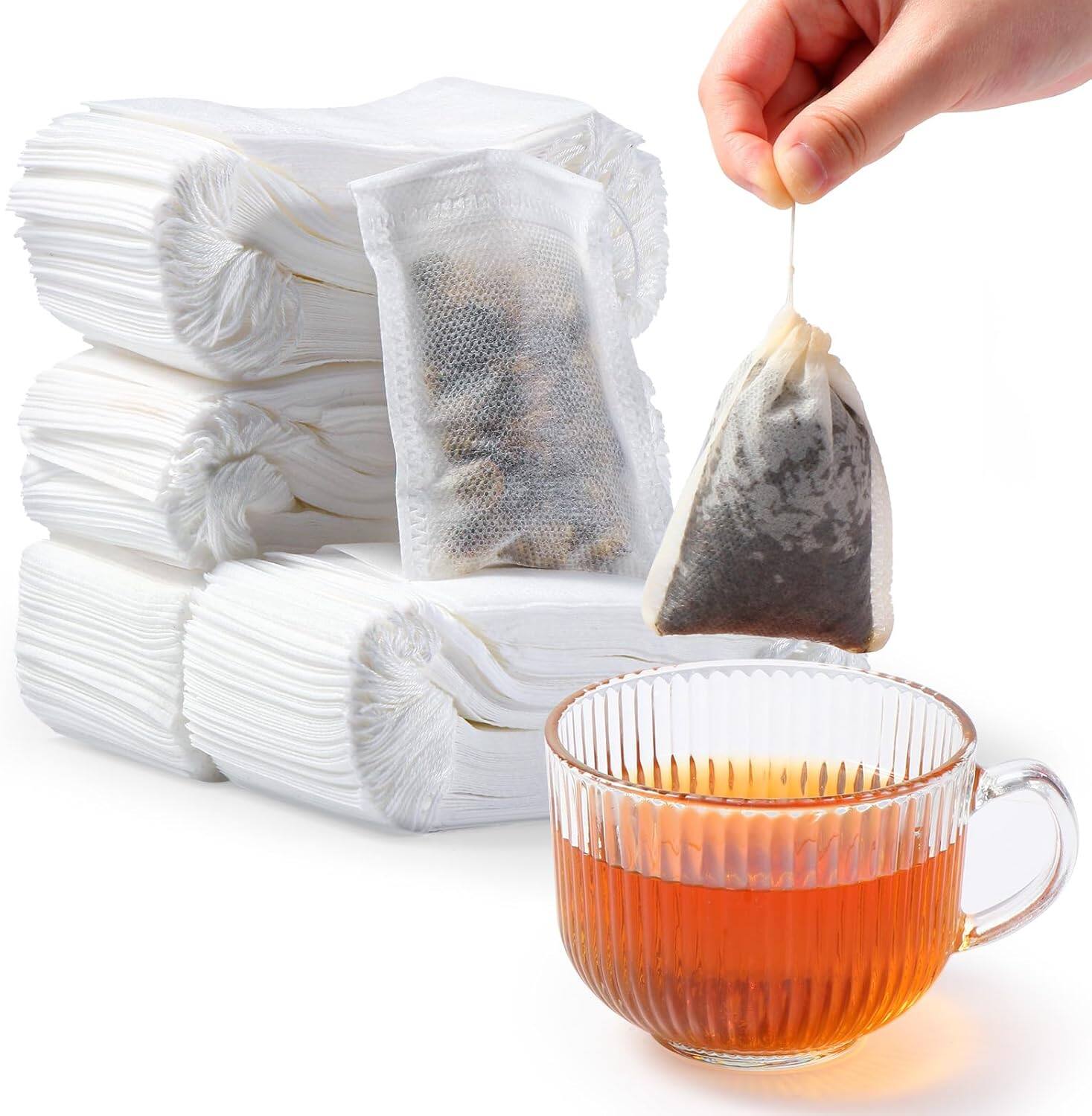 Front. Auledio - 400 x Disposable Paper Tea Filter with Drawstring, Disposable Tea Bag, Tea Filter for Loose Tea Spices (7cm x 9cm).