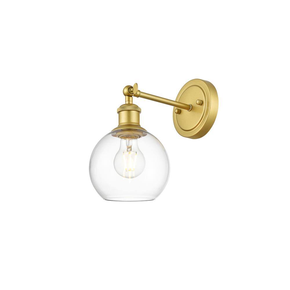 Back. Living District - Kai 1 light Brass and Clear Bath Sconce - Brass And Clear.