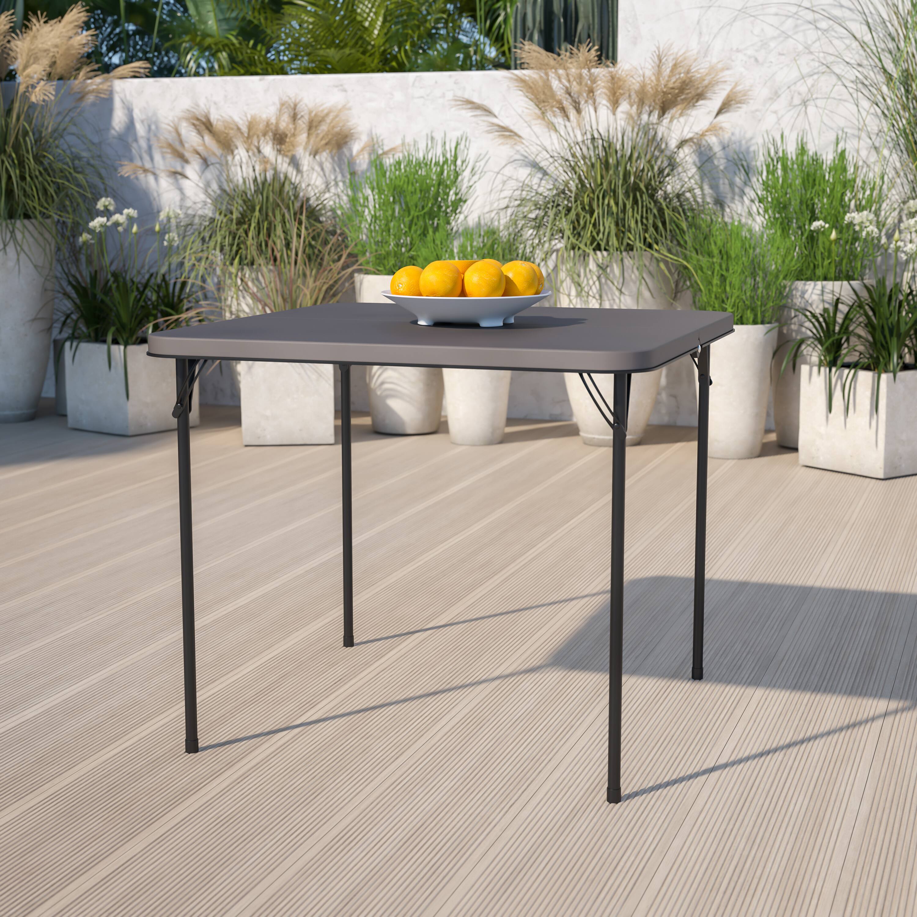 Alt View 12. Alamont Home - 2.83-Foot Square Bi-Fold Plastic Folding Table with Carrying Handle - Dark Gray.