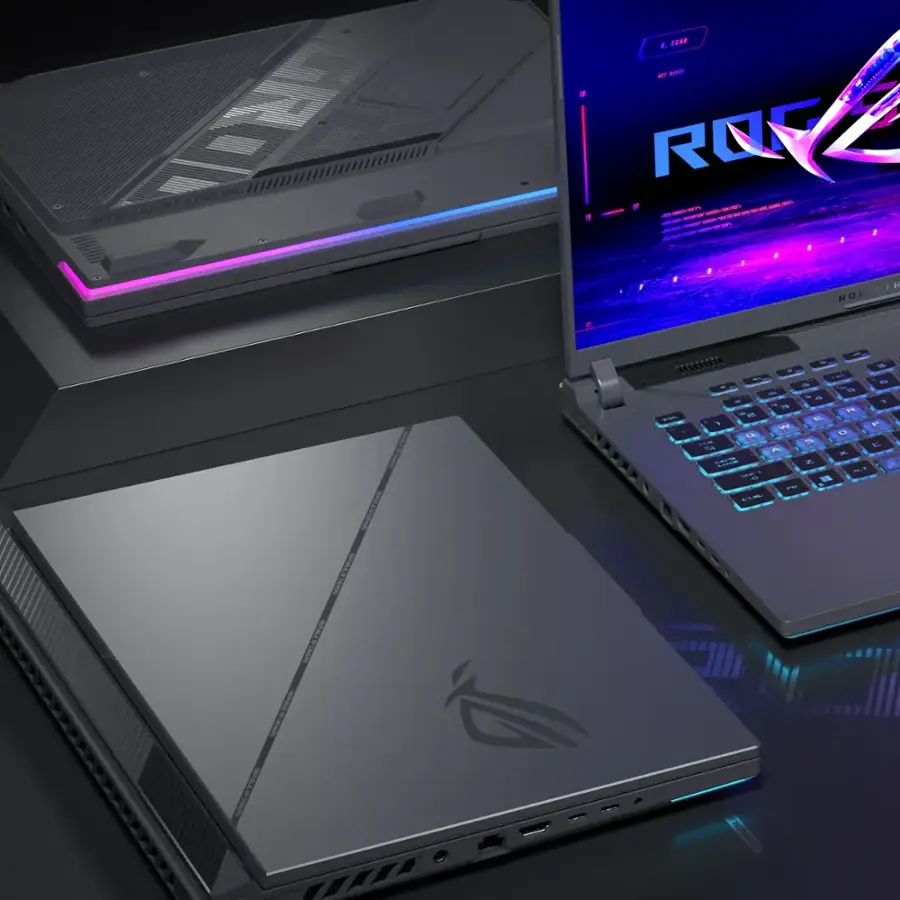 The text on the image reads: "ROG - Intelligent Cooling - ROG - Gaming Laptop - PIVA HGETIS SELVUAA - I nointoa MAAS! - 1 - - - - - 1 - - - 5 - . S I - - - - . . - 1 - - -  1 I  - 14 - 1 S C u 7 A  A  D. - N .. - REPULSIVE."