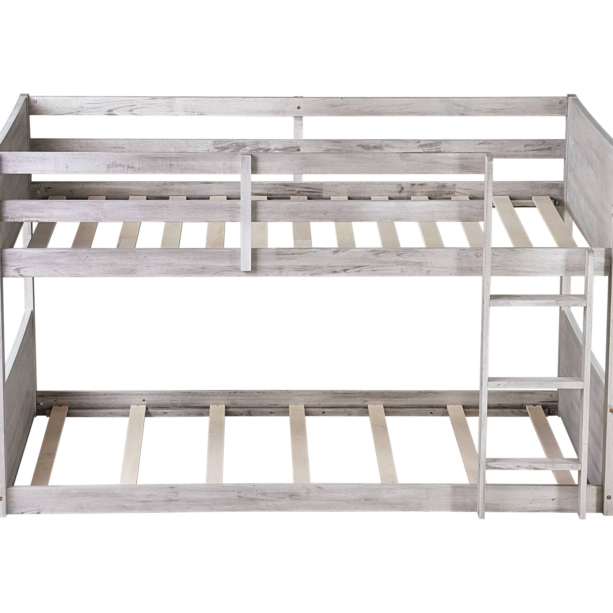 Angle. GOODSILO - Solid Wood Twin Over Twin Floor Bunk Bed with Panelled Headboard and Footboard, Built-in Ladder and Safety Guardrails - Antique White.