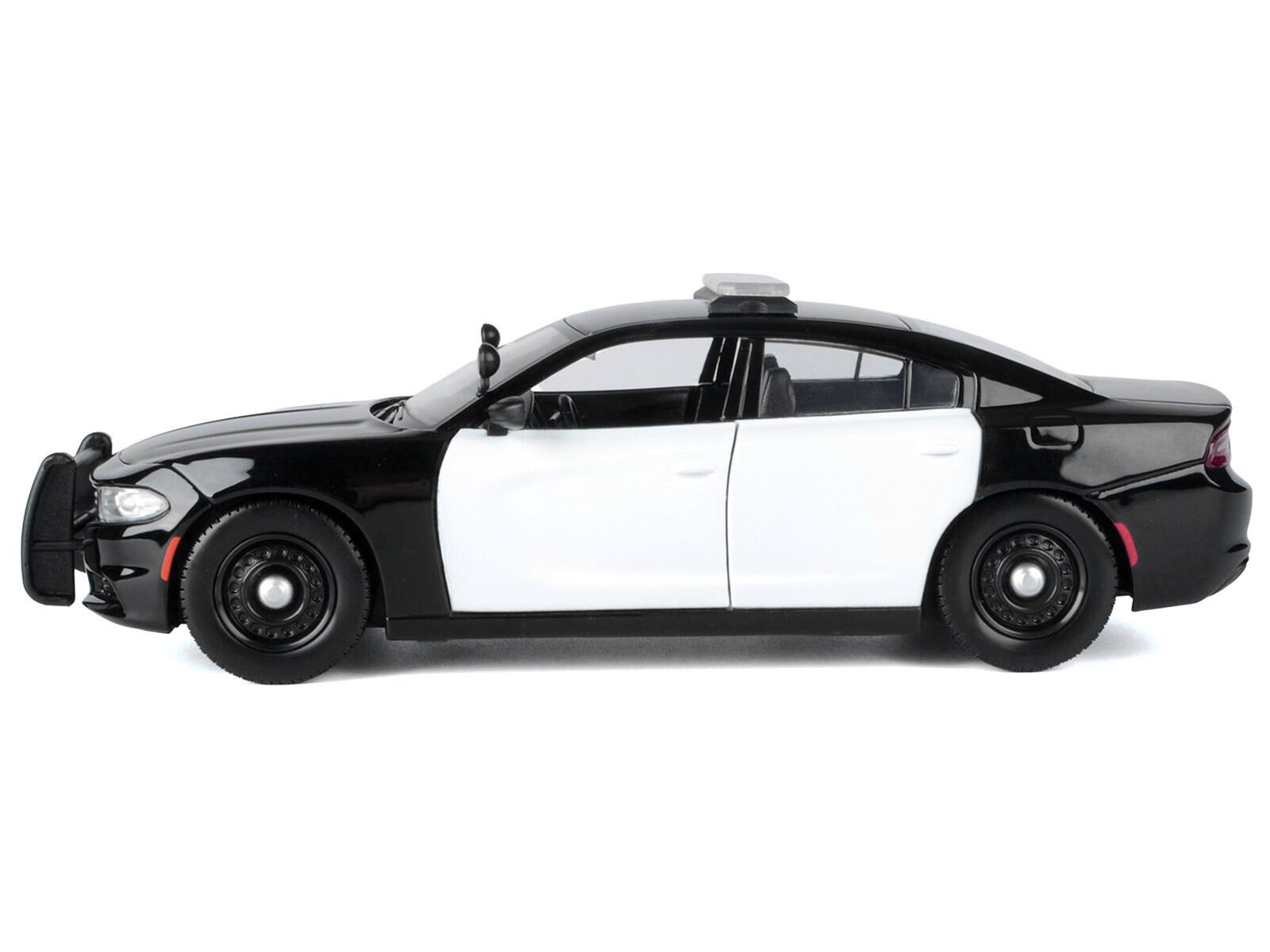 Left. Motormax - 2023 Dodge Charger Pursuit Police Car Black and White "Law Enforcement and Public Service" Series 1/24 - Black and White.