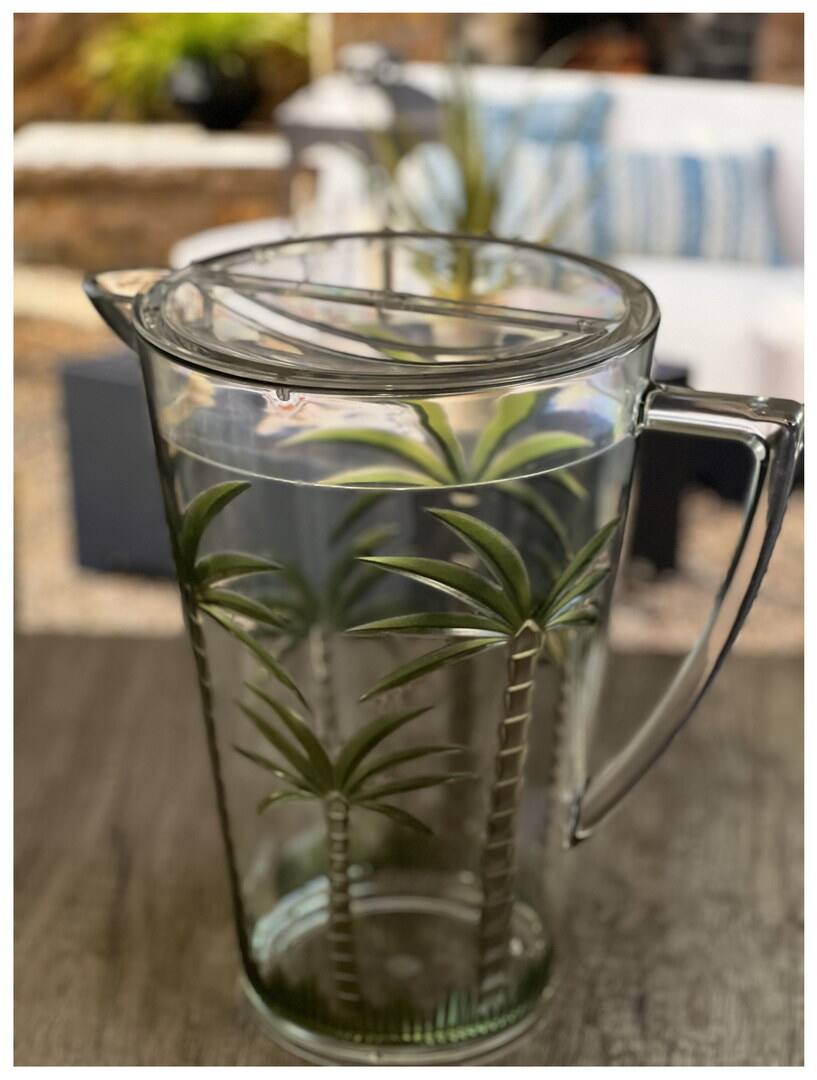 Left. APRILSOUL - Quarts Water Pitcher with Lid Palm Tree Design Unbreakable Plastic BPA Free Juice Pitcher - white.