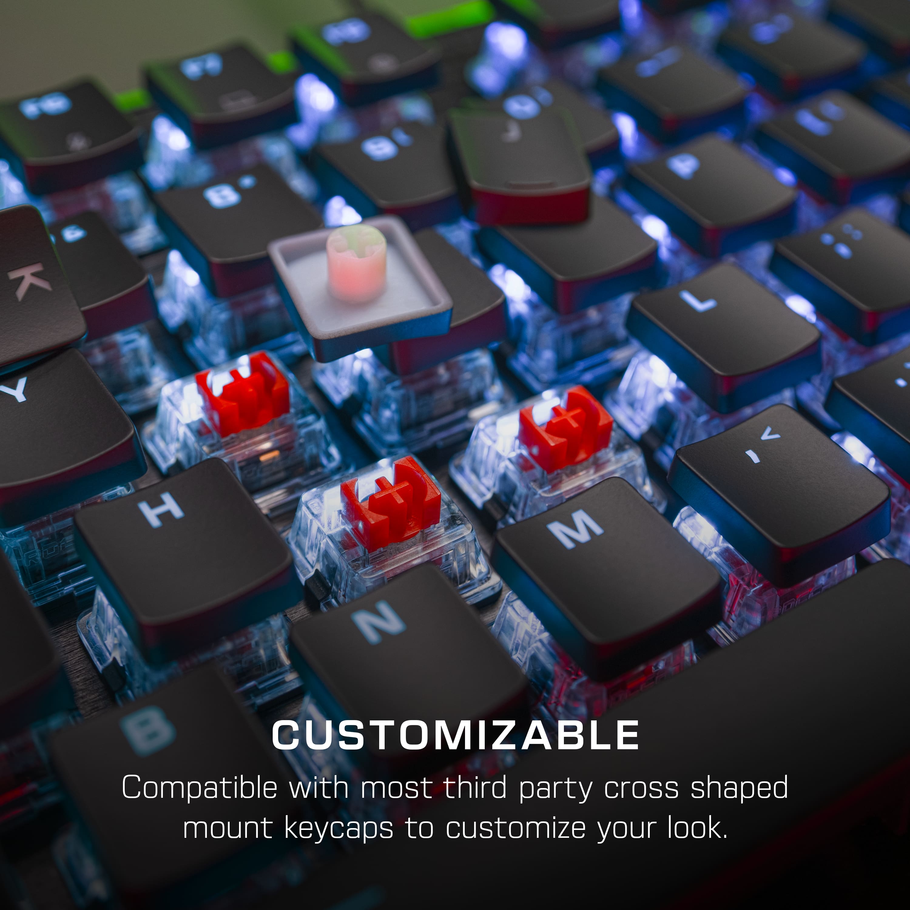 The text on the image reads: "Customizable. Compatible with most third party cross shaped mount keycaps to customize your look."