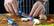 Left. SiliSlick - Rainbow Titanium-Coated Stainless Steel Kitchen Knife Set - Black Handle.