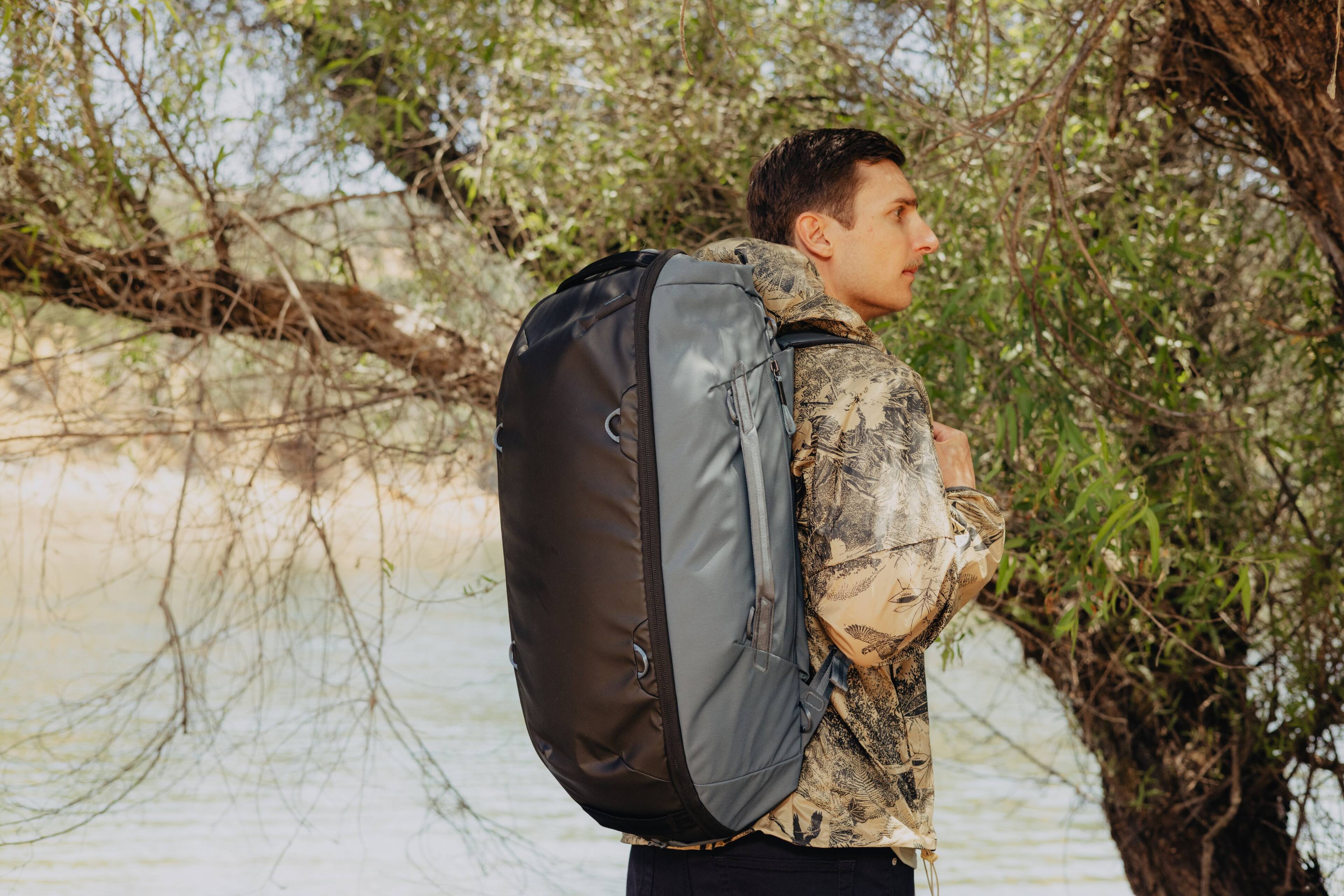 Left. Peak Design - Travel Duffelpack 65L - Ocean.