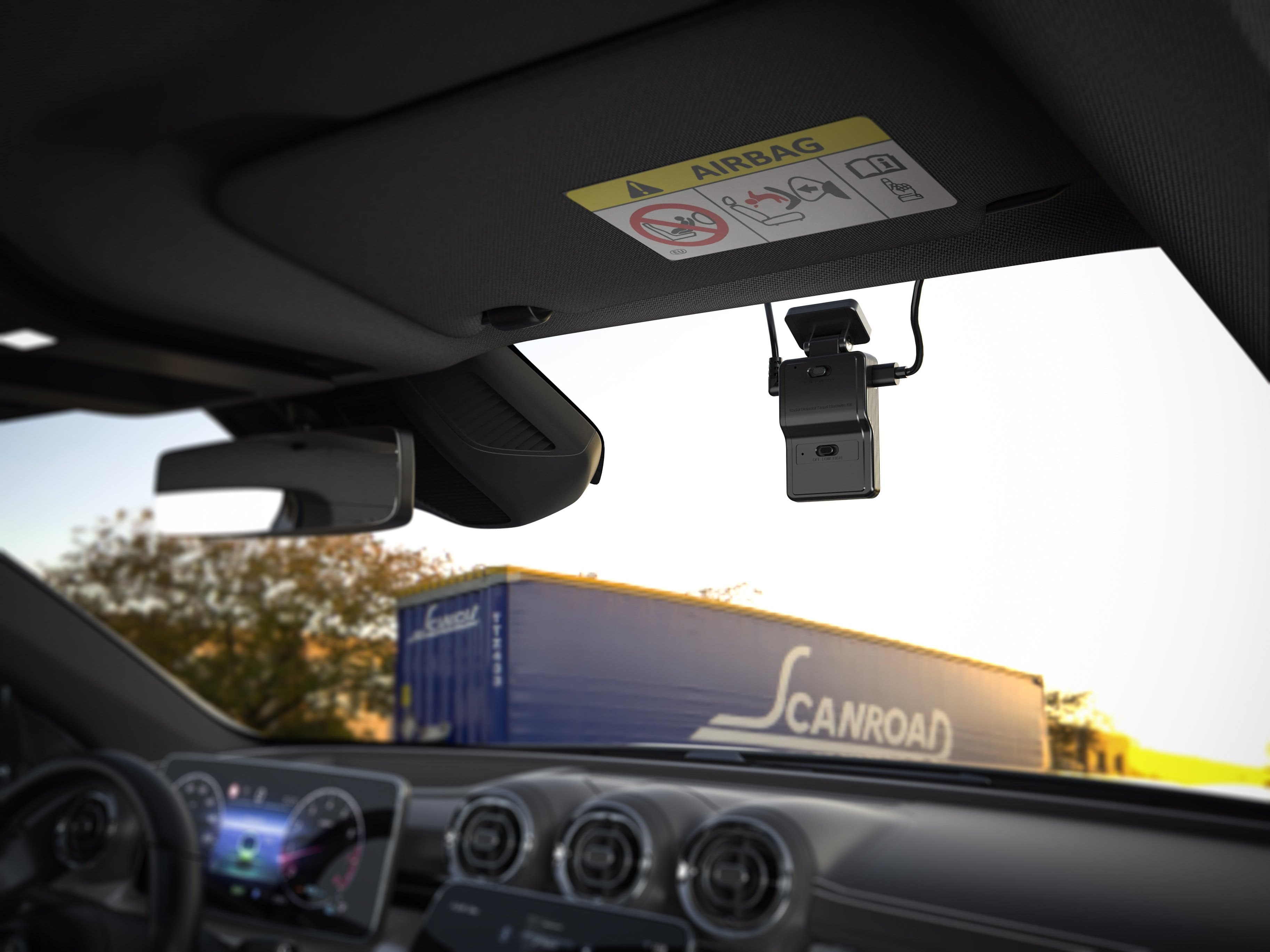 The text on the image reads "AIRBAG sg C feci SCANROAD CANROAD." This text is likely a warning or information label for the airbag system in the vehicle.