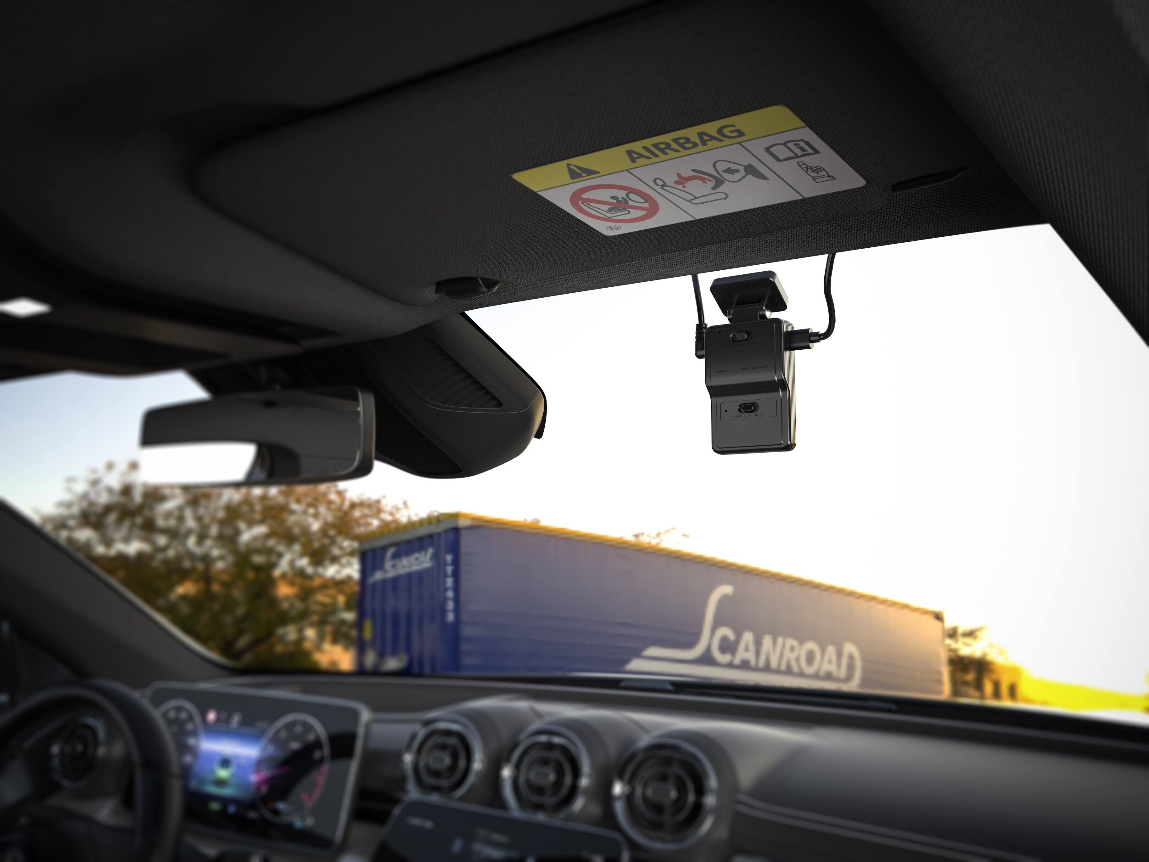 The text on the image reads "AIRBAG sg C feci SCANROAD CANROAD." This text is likely a warning or information label for the airbag system in the vehicle.