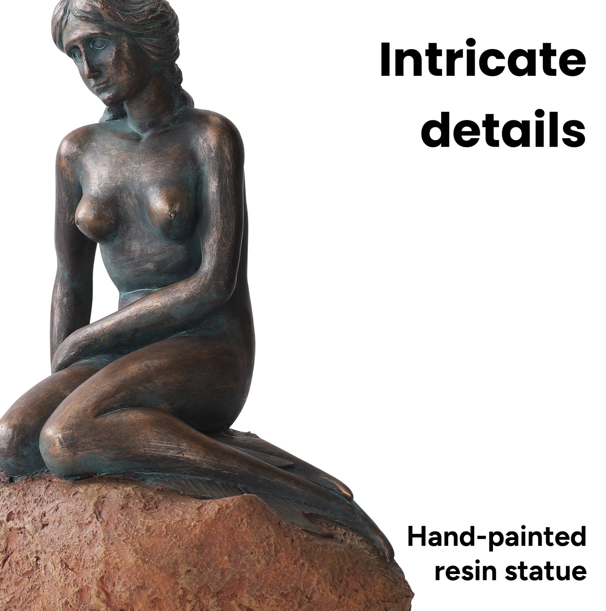 Intricate details  
Hand-painted resin statue