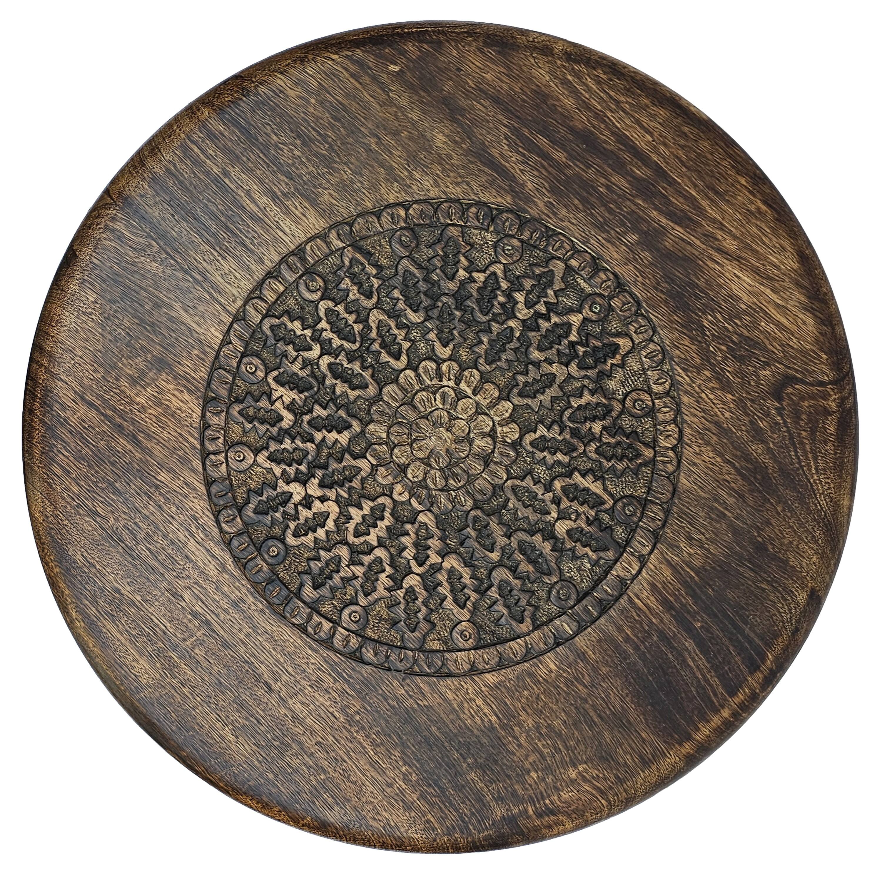 Left. Manhattan Lane - Ama 22 Inch Side End Table, Round Top, Indian Mandala Floral Carving, 3 Legs, Brown Mango Wood - Brown.