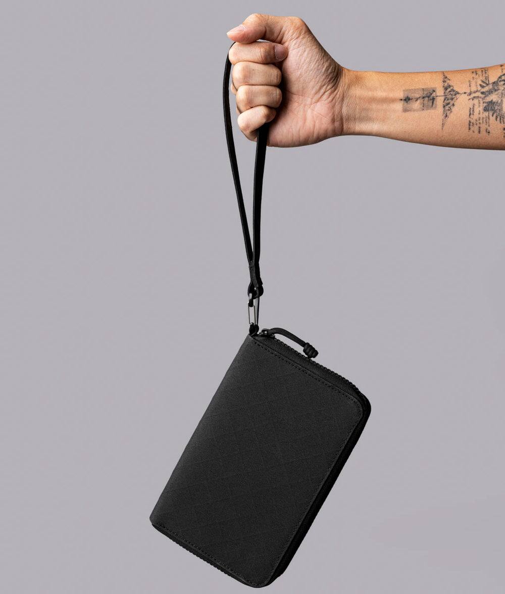 Alt View 9. ALPAKA - RFID Zip Passport Wallet with Boarding Pass Pocket, 7 Card Slots, Magnetic Flaps, Detachable Hand Strap - Black Axogrid 300D.