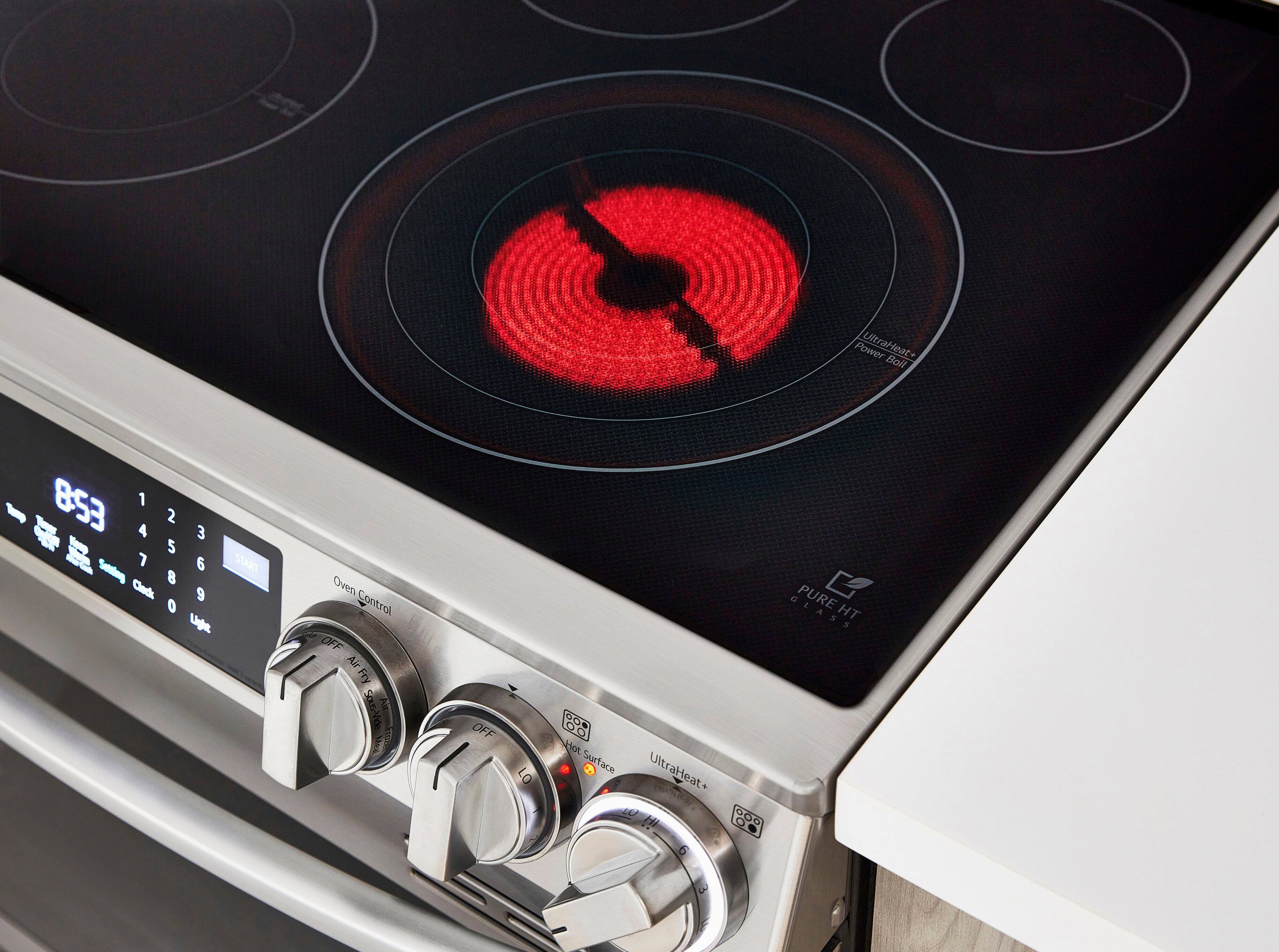 The text on the image reads: "Power UltraHeat+ Boil 853 1 2 4 3 5 6 START - 8 Cedk 9 0 Liga Oven Control OFF Air Fry Saus-Vide Not OFF LO 00 dot Surface UltraHeat+ 000 1 a PURE HT HT."