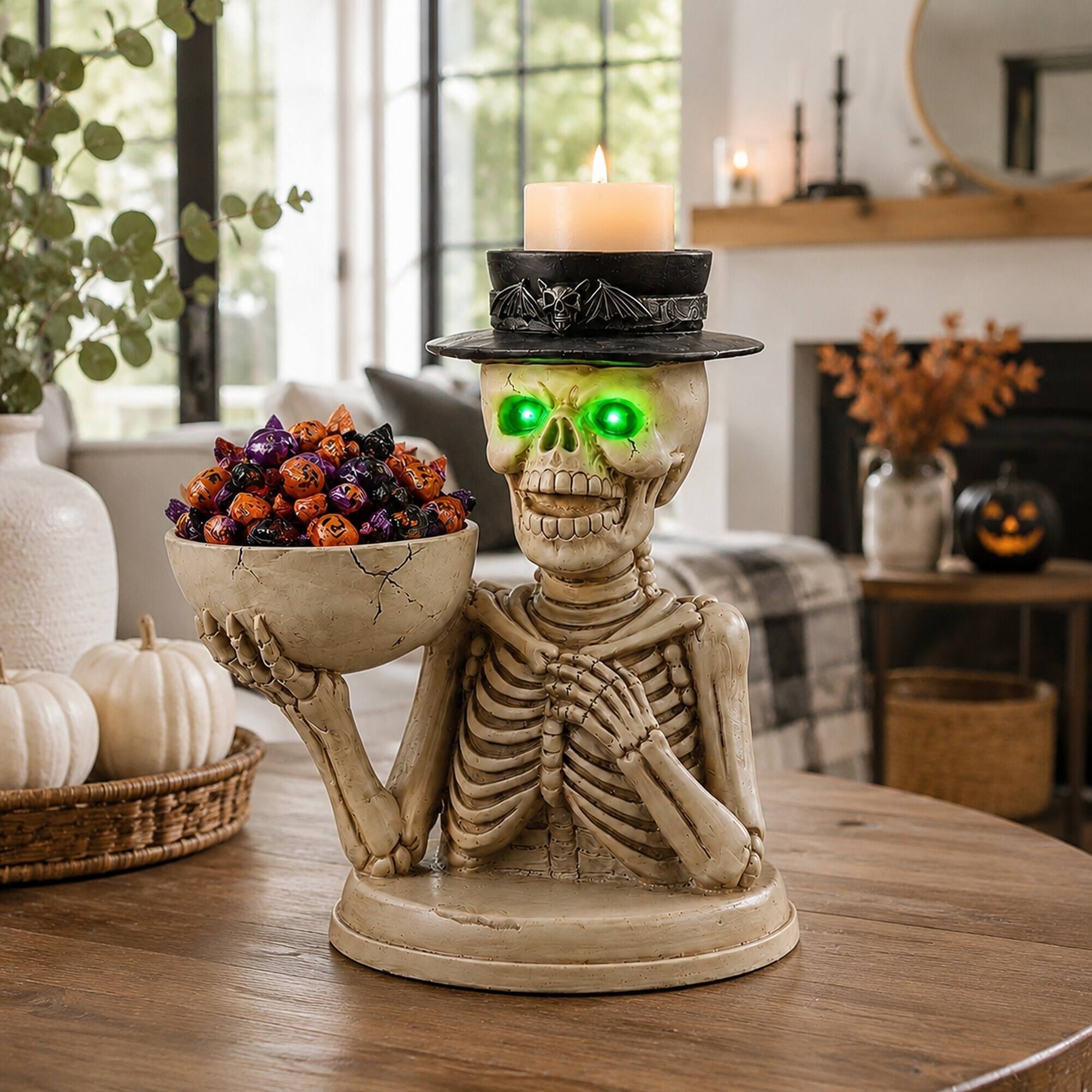 Back. RYHNUYNE - Spooky Halloween Skeleton Figurine with LED Glowing Eyes, Candy Bowl and Candle Holder for Indoor Home Decor - White.