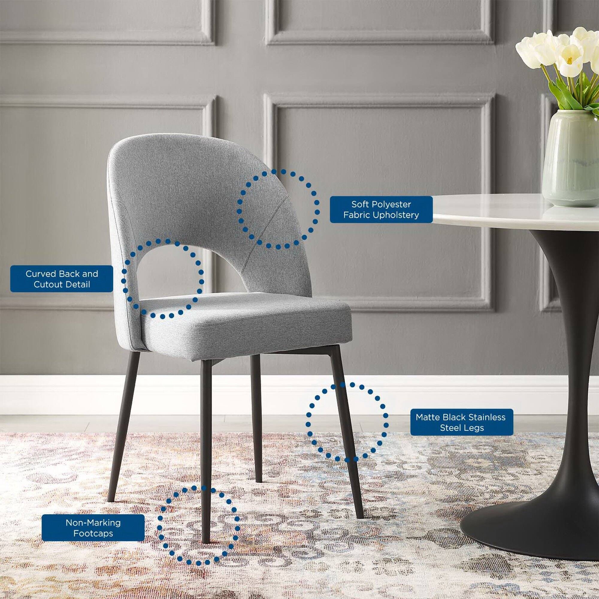 - Soft Polyester Fabric Upholstery
- Curved Back and Cutout Detail
- Matte Black Stainless Steel Legs
- Non-Marking Footcaps