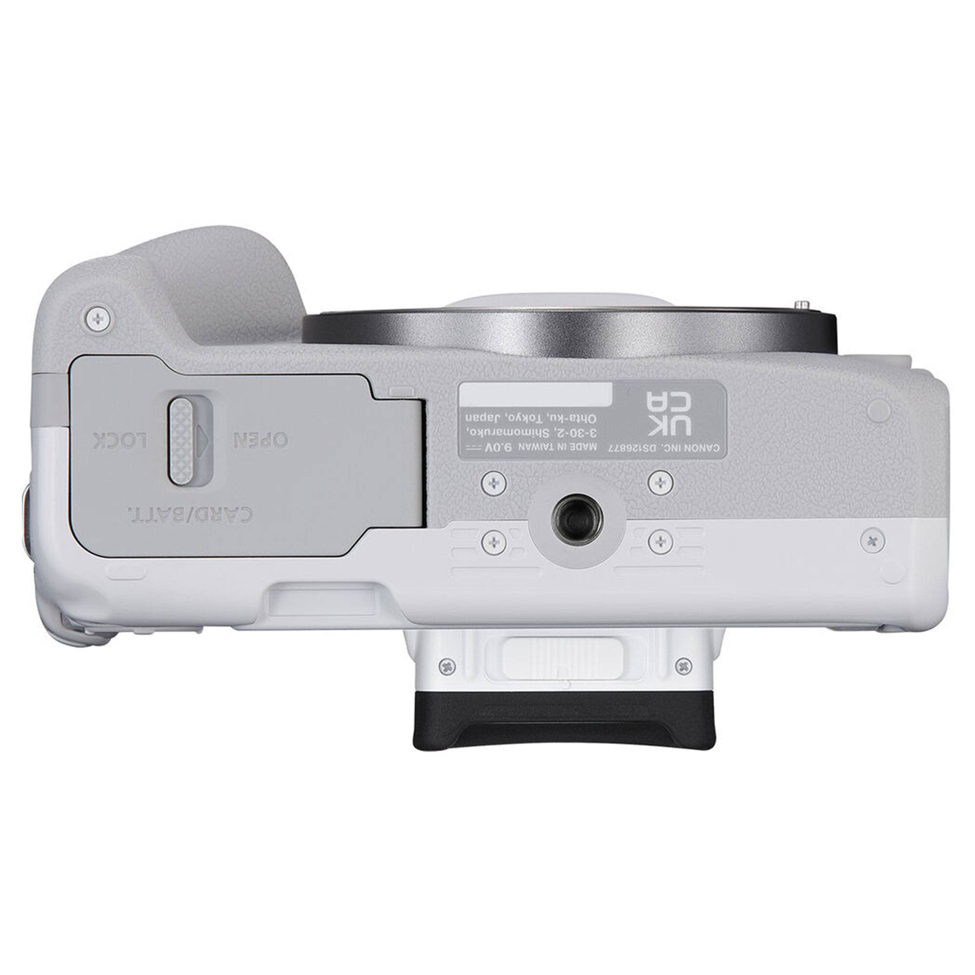 Sure, here is the corrected and grouped text from the image:

**Top Left:**
- T OPEN C Japan Tokyo, Ohta-ku, Shimomaruko, 3-30-2.

**Top Right:**
- NK 9.0V
- TAIWAN M MADE DS126877 INC CANON

**Bottom Right:**
- CANON INC.
- MADE IN JAPAN
- 2008-C-2008
- 2008-06 MANUFACTURED
- 2008-06

**Front:**
- CANON/CHART

**Lens:**
- DC
- DC
- "Charger" "Battery" "Charger"